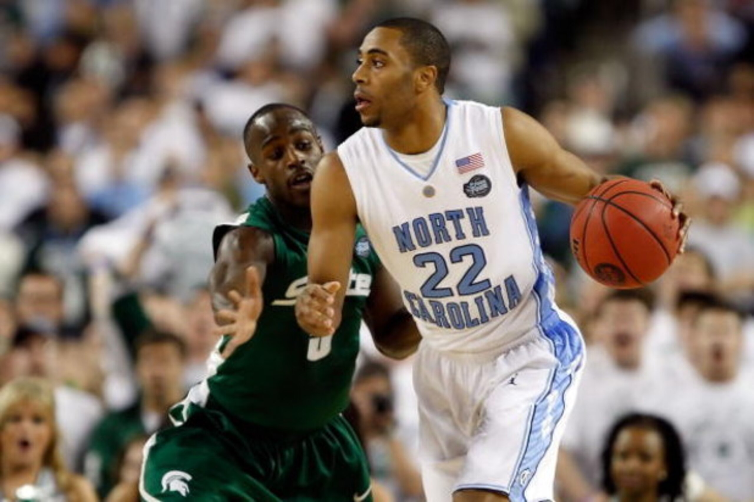 DETROIT - APRIL 06:  Wayne Ellington #22 of the North Carolina Tar Heels drives on Travis Walton #5 of the Michigan State Spartans during the 2009 NCAA Division I Men's Basketball National Championship game at Ford Field on April 6, 2009 in Detroit, Michi