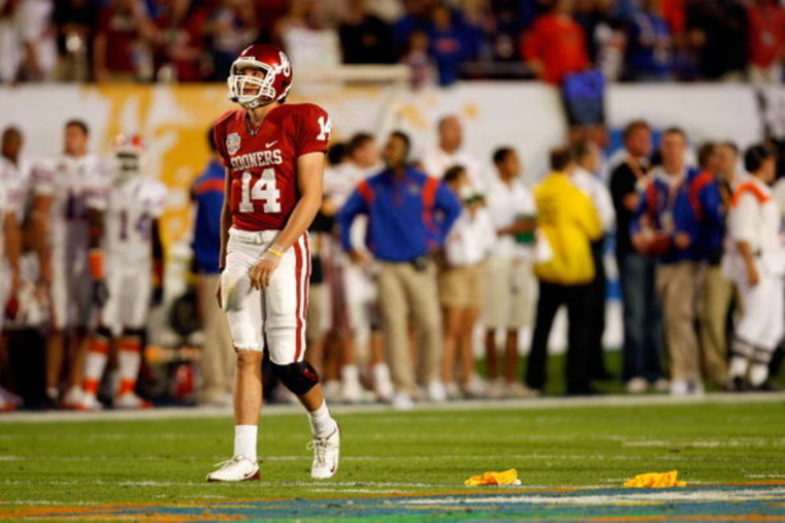 MIAMI - JANUARY 08:  Quarterback Sam Bradford #14 of the Oklahoma Sooners reacts after Oklahoma was called fror a holding penalty which negated a first down against the Florida Gators during the FedEx BCS National Championship game at Dolphin Stadium on J