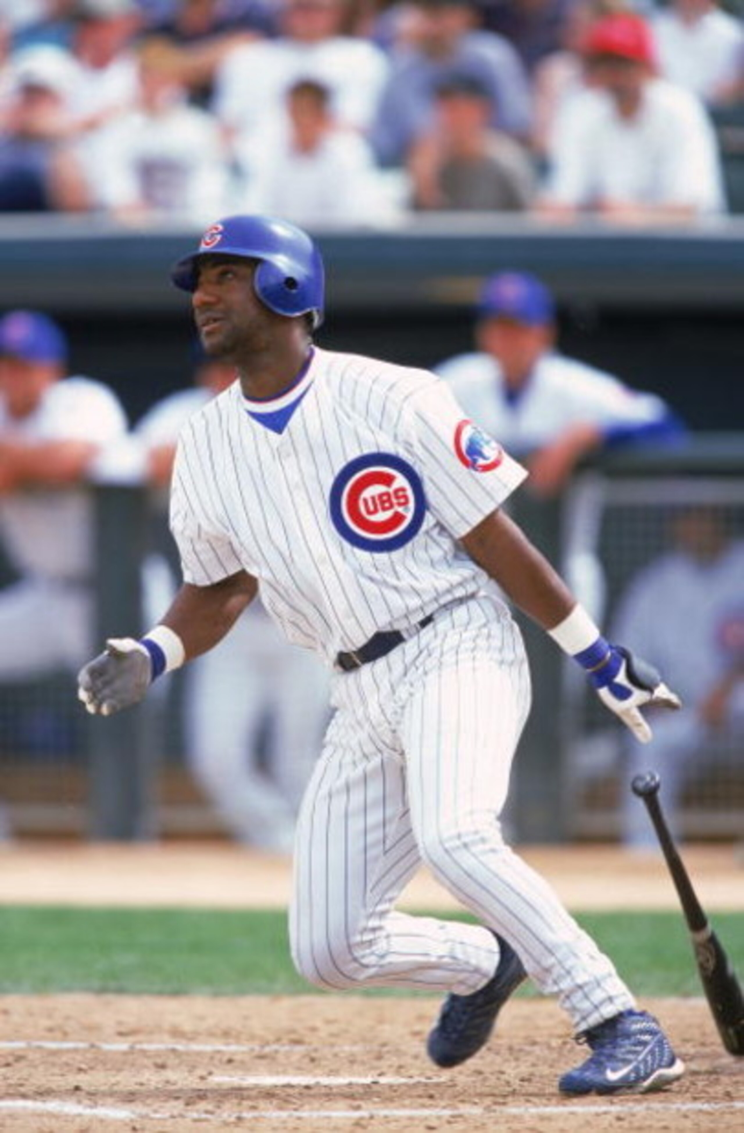 15 Mar 2000:  Ricky Gutierrez #12 of the Chicago Cubs watches the ball after hitting it during the Spring Training Game against the Milwaukee Brewers at the HoHoKam Stadium in Mesa, Arizona. The Cubs defeated the Brewers 10-4. Mandatory Credit: Donald Mir