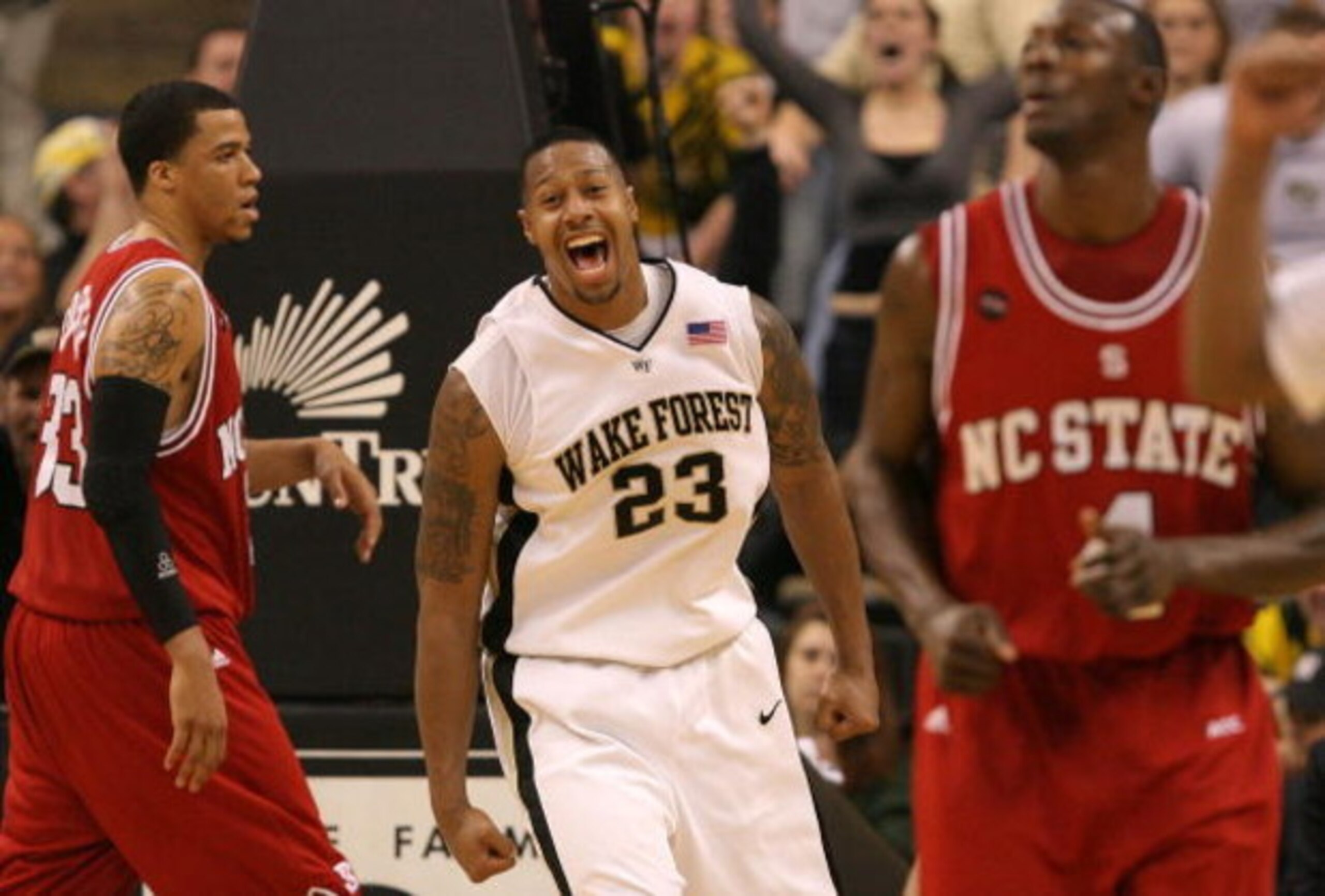 WINSTON-SALEM, NC - FEBRUARY 26:  James Johnson #23 of the Wake Forest Demon Deacons reacts to a dunk against the North Carolina State Wolfpack during the Demon Deacons 85-78 victory at Lawrence Joel Coliseum on February 26, 2009 in Winston-Salem, North C