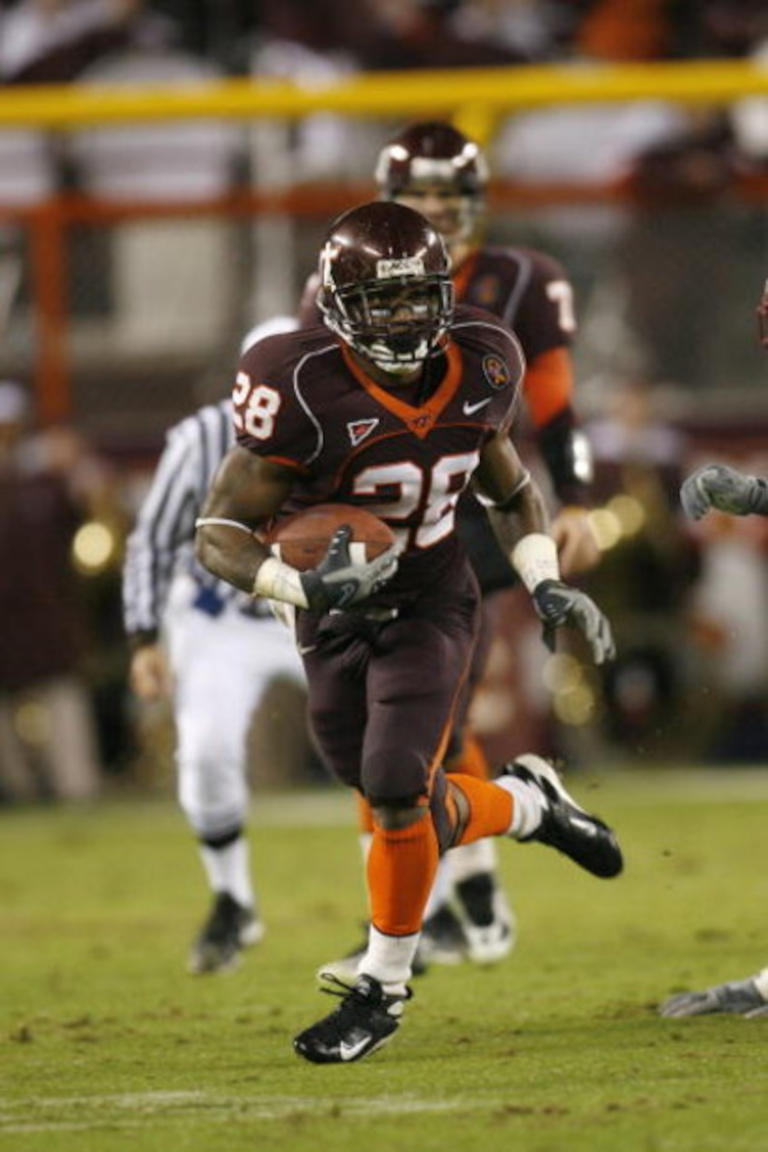 BLACKSBURG ? OCTOBER 25:  Michael Dell'Aquila #28 of the Virginia Tech Hokies carries the ball during the game against the Boston College Eagles at Lane Stadium on October 25, 2007 in Blacksburg, Virginia. (Photo by Kevin C. Cox/Getty Images)