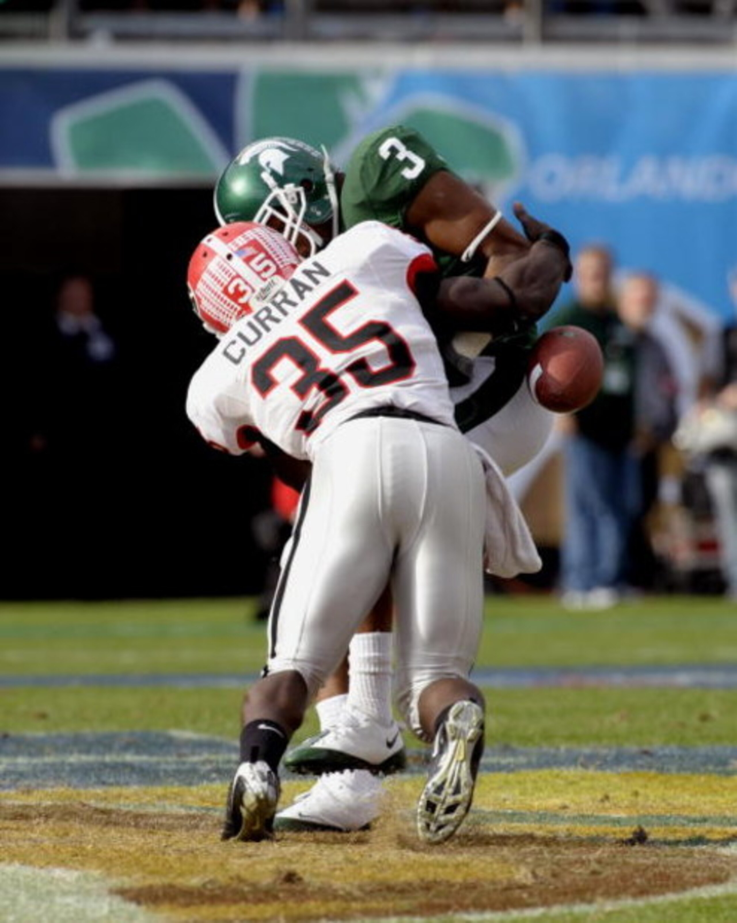 ORLANDO, FL - JANUARY 1: Wide receiver B. J. Cunningham #3 of the Michigan State Spartans bobbles a pass against the Georgia Bulldogs at the 2009 Capital One Bowl at the Citrus Bowl on January 1, 2009 in Orlando, Florida.  (Photo by Al Messerschmidt/Getty