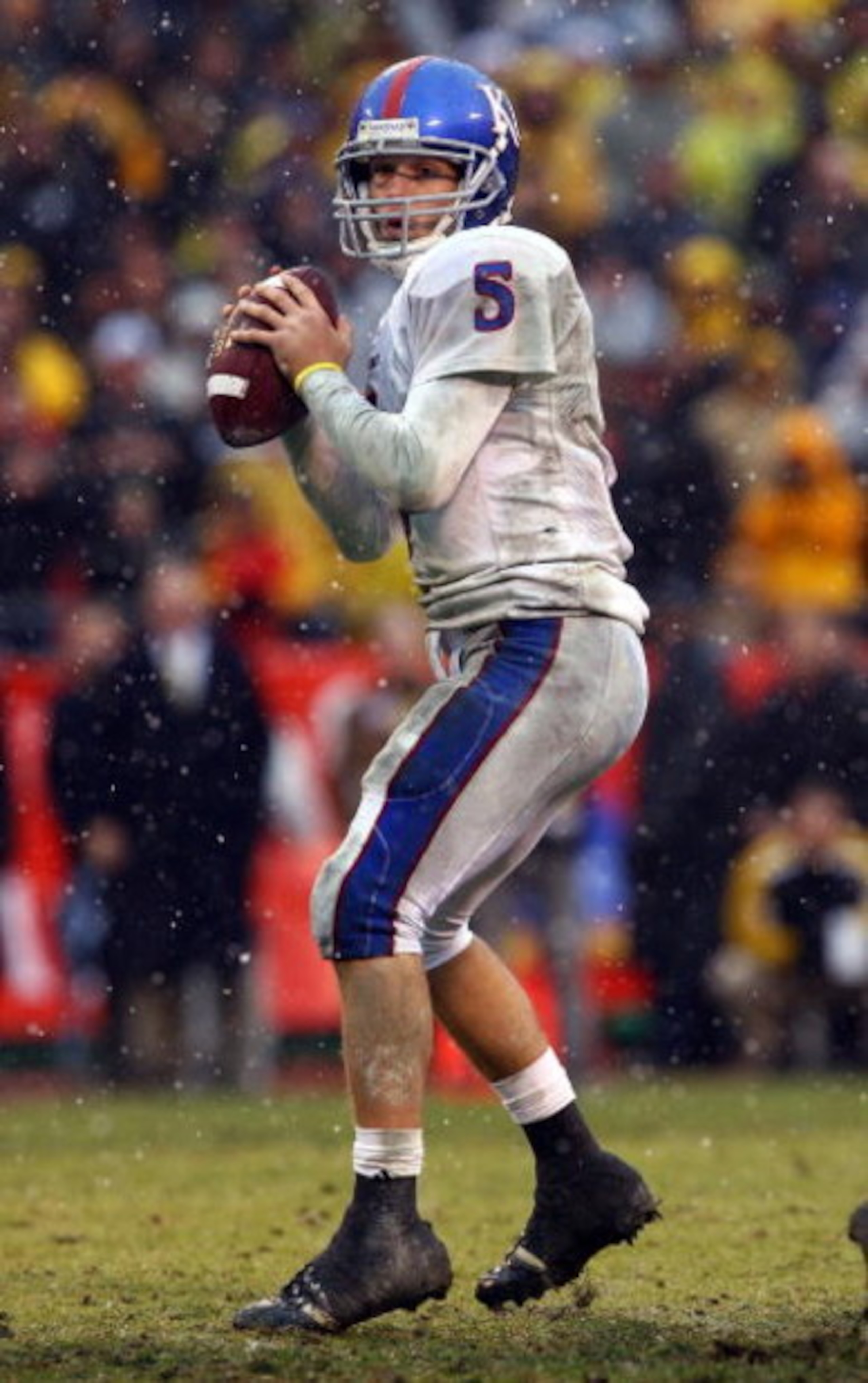 KANSAS CITY, MO - NOVEMBER 29:  Quarterback Todd Reesing #5 of the Kansas Jayhawks passes during the second half of the game against the Missouri Tigers on November 29, 2008 at Arrowhead Stadium in Kansas City, Missouri.  (Photo by Jamie Squire/Getty Imag