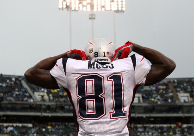 OAKLAND, CA - DECEMBER 14: Randy Moss #81 of the New England Patriots celeberates after scoring a touchdown against the Oakland Raiders during an NFL game on December 14, 2008 at the Oakland-Alameda County Coliseum in Oakland, California.  (Photo by Jed J