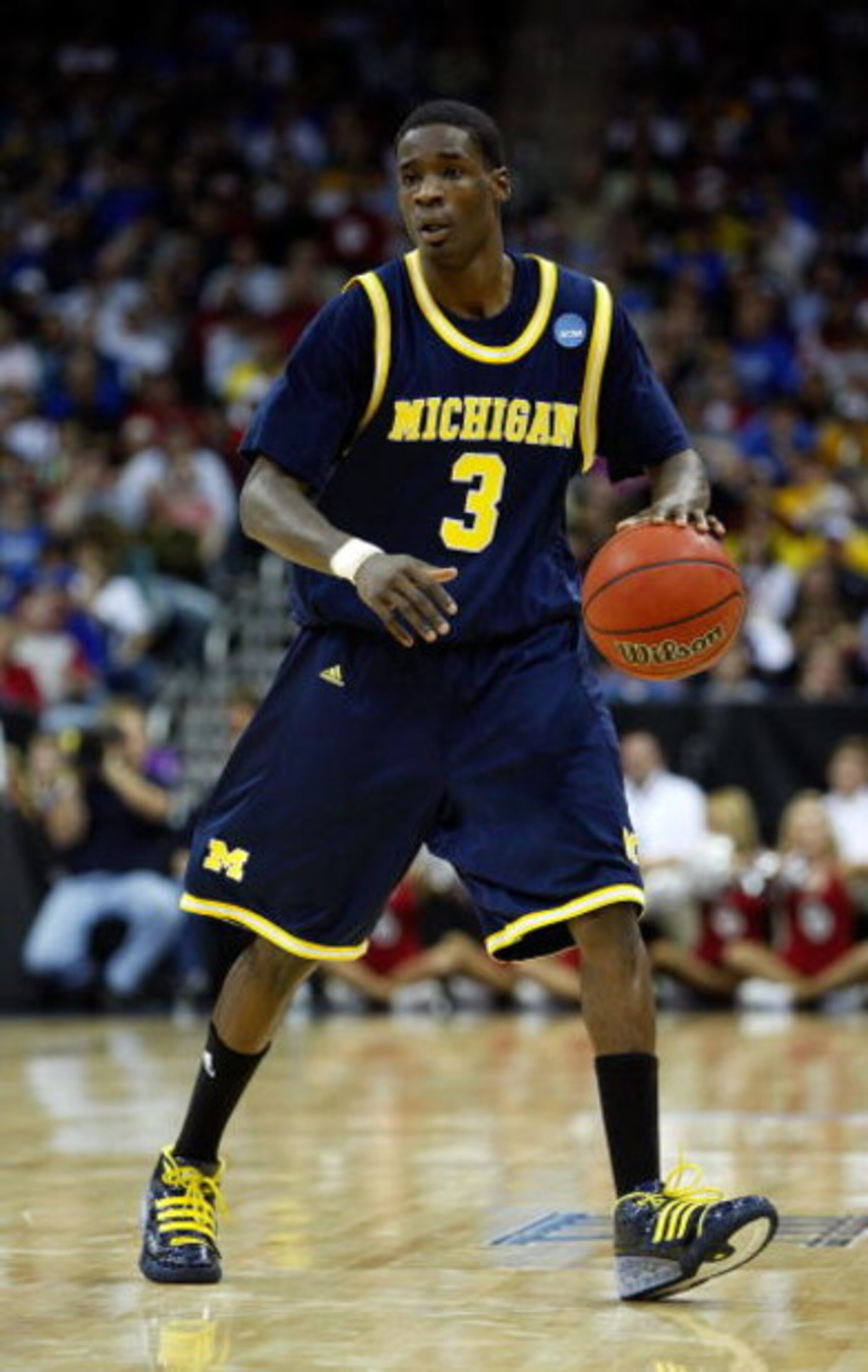 KANSAS CITY, MO - MARCH 21:  Manny Harris #3 of the Michigan Wolverines dribbles the ball against the Oklahoma Sooners during the second round of the NCAA Division I Men's Basketball Tournament at the Sprint Center on March 21, 2009 in Kansas City, Missou