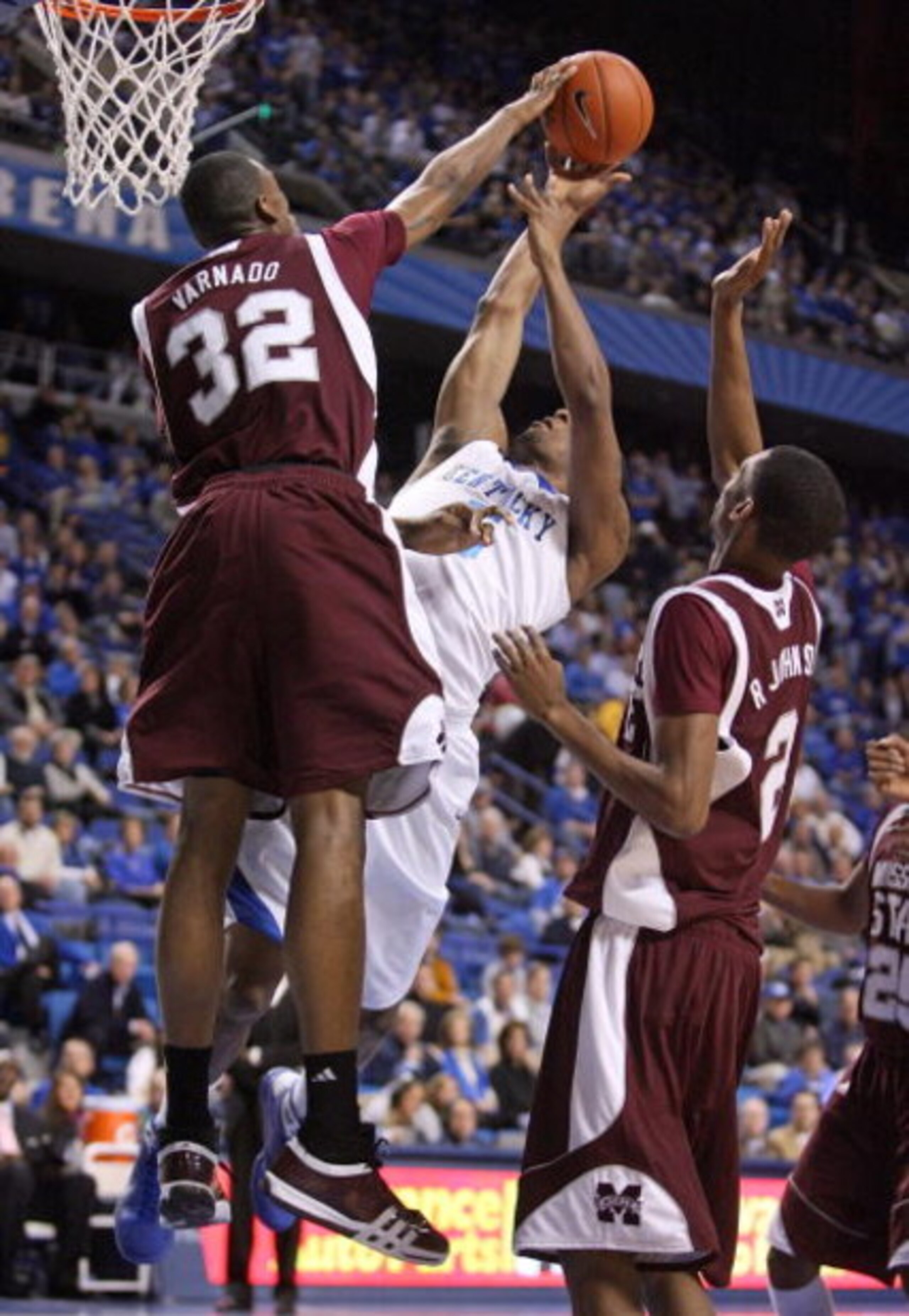 LEXINGTON, KY - FEBRUARY 3:  Jarvis Varnado #32 of the Mississippi State Bulldogs blocks the shot of Ramon Harris #5 of the Kentucky Wildcats during the SEC game at Rupp Arena February 3, 2009 in Lexington, Kentucky. Mississippi State won 66-57.  (Photo b