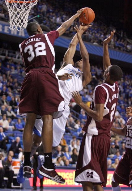LEXINGTON, KY - FEBRUARY 3:  Jarvis Varnado #32 of the Mississippi State Bulldogs blocks the shot of Ramon Harris #5 of the Kentucky Wildcats during the SEC game at Rupp Arena February 3, 2009 in Lexington, Kentucky. Mississippi State won 66-57.  (Photo b