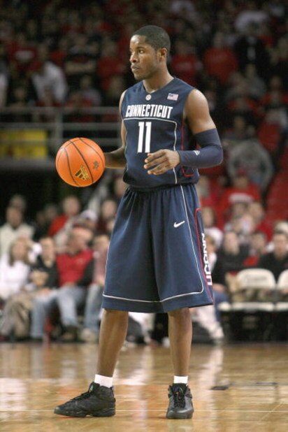 LOUISVILLE, KY - FEBRUARY 2: Jerome Dyson #11 of the Connecticut Huskies dribbles the ball during the Big East Conference game against the Louisville Cardinals on February 2, 2009 at Freedom Hall in Louisville, Kentucky.  (Photo by Andy Lyons/Getty Images