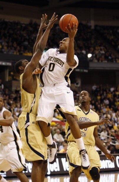 WINSTON-SALEM, NC - FEBRUARY 18:  Jeff Teague #0 of the Wake Forest Demon Deacons jumps to the basket for a lay up during their game against the Georgia Tech Yellow Jackets at Lawrence Joel Coliseum on February 18, 2009 in Winston-Salem, North Carolina. T