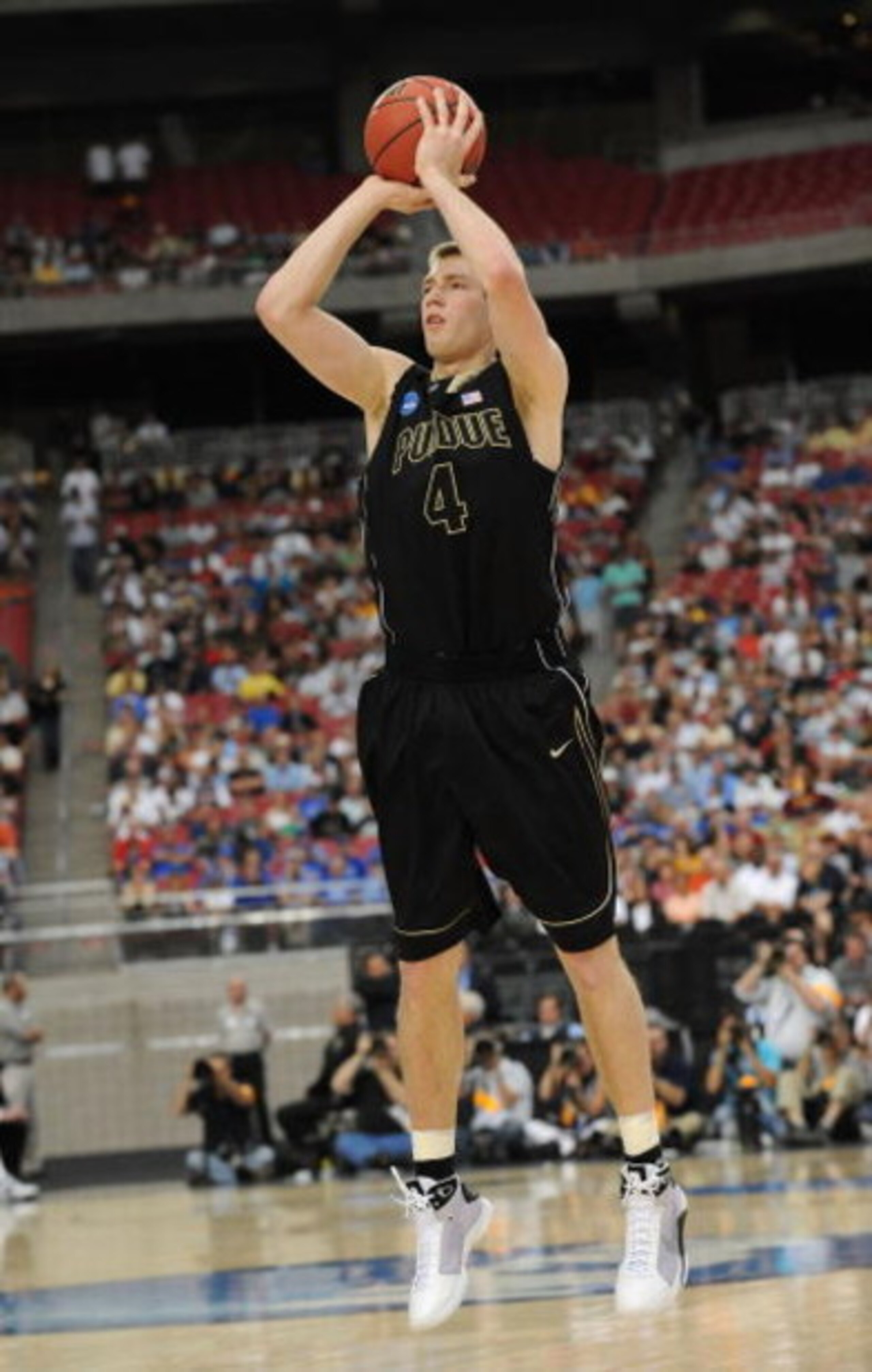 GLENDALE, AZ - MARCH 26:  Forward Robbie Hummel #4 of the Purdue Boilermakers takes a shot against the Connenticut Huskies in the Sweet 16 of the NCAA Division I Men's Basketball Tournament at the University of Phoenix Stadium on March 26, 2009 in Glendal