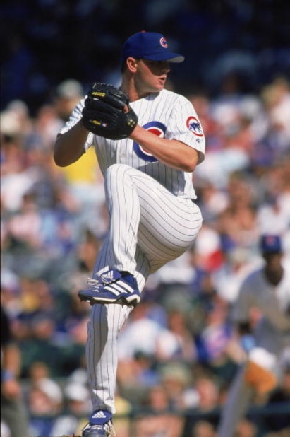 CHICAGO - JUNE 19:  Pitcher Joe Borowski #48 of the Chicago Cubs winds up during the MLB game against the Chicago White Sox at Wrigley Field in Chicago, Illinois on June 16, 2002. The White Sox defeated the Cubs 10-7. (Photo by Jonathan Daniel/Getty Image