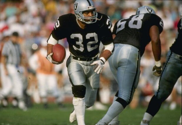 23 Mar 1997: Running back Marcus Allen of the Los Angeles Raiders in action during a game against the Phoenix Cardinals at the Memorial Coliseum in Los Angeles, California. The Raiders won the game, 16-14.