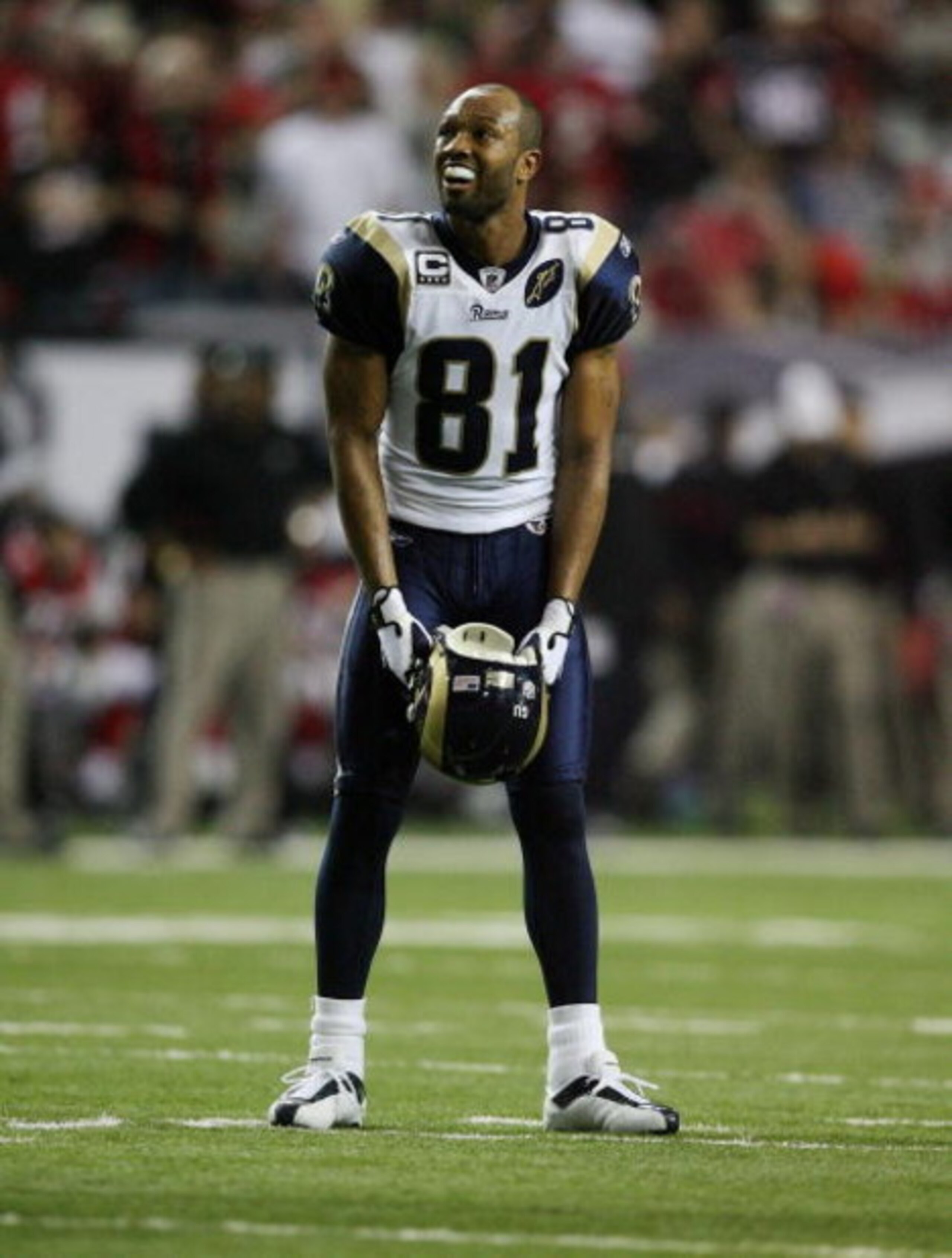 ATLANTA - DECEMBER 28:  Torry Holt #81 of the St. Louis Rams reacts as he is pulled from the game near the goal line in the fourth quarter while taking on the Atlanta Falcons at Georgia Dome on December 28, 2008 in Atlanta, Georgia. The Falcons defeated t