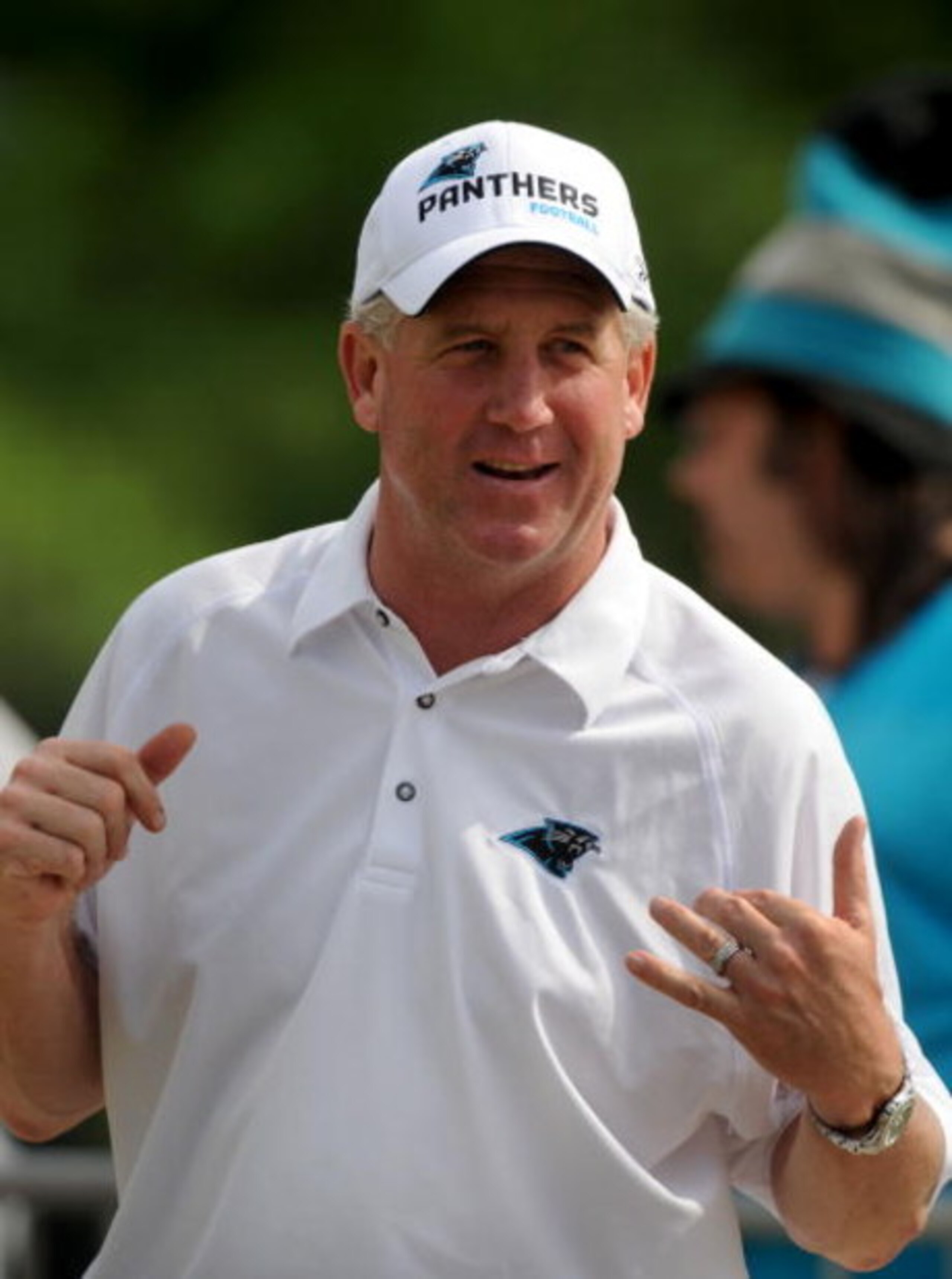 CHARLOTTE,NC- MAY 1: Head Coach John Fox (R) smiles as he talks to some fans after the minicamp practice  at the team's practice facility on May 1, 2009 in Charlotte, North Carolina. (Photo by Steve Dykes/Getty Images)