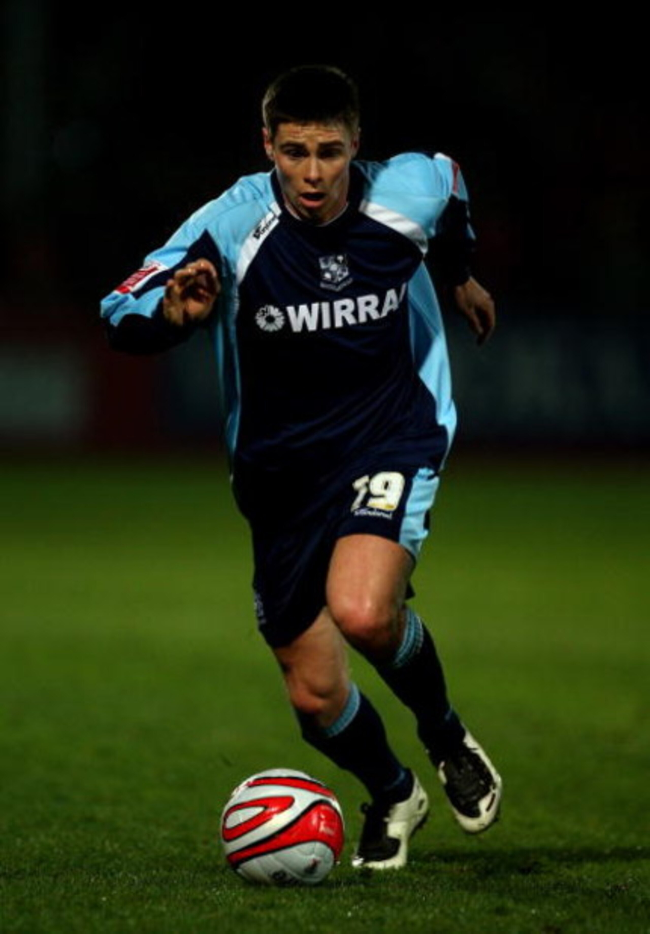 CHELTENHAM, UNITED KINGDOM - MARCH 17:  Charlie Barnett of Rovers runs with the ball during the Coca-Cola League 1 match between Cheltenham Town and Tranmere Rovers at Whaddon Road on March 17, 2009 in Cheltenham, England.  (Photo by Richard Heathcote/Get
