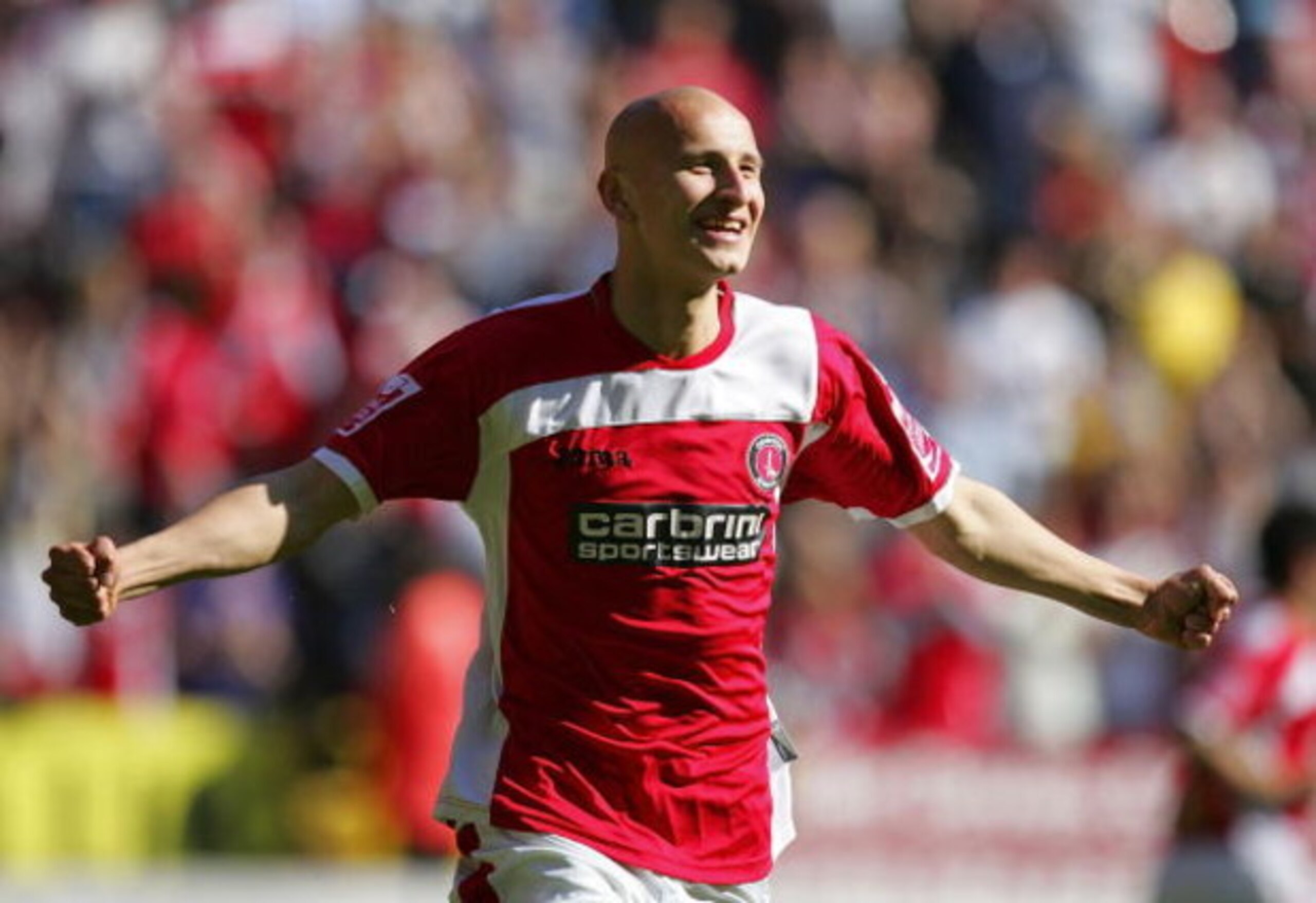LONDON, ENGLAND - APRIL 18: Jonjo Shelvey of Charlton Athletic celebrates scoring his sides second goal during the Coca Cola Championship match between Charlton Athletic and Blackpool at The Valley on April 18, 2009 in London, England.  (Photo by Tom Dula