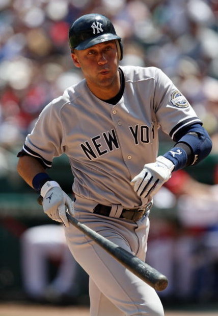 ARLINGTON, TX - MAY 25:  Designated hitter Derek Jeter #2 of the New York Yankees backs up from a pitch against the Texas Rangers on May 25, 2009 at Rangers Ballpark in Arlington, Texas.  (Photo by Ronald Martinez/Getty Images)