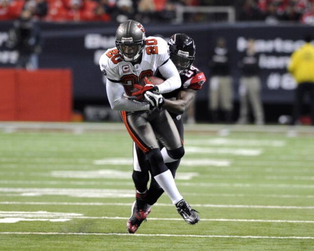 ATLANTA - DECEMBER 14:  Cornerback Ronde Barber #20 of the Tampa Bay Buccaneers intercepts a second-quarter pass against the Atlanta Falcons at the Georgia Dome on December 14, 2008 in Atlanta, Georgia.  (Photo by Al Messerschmidt/Getty Images)