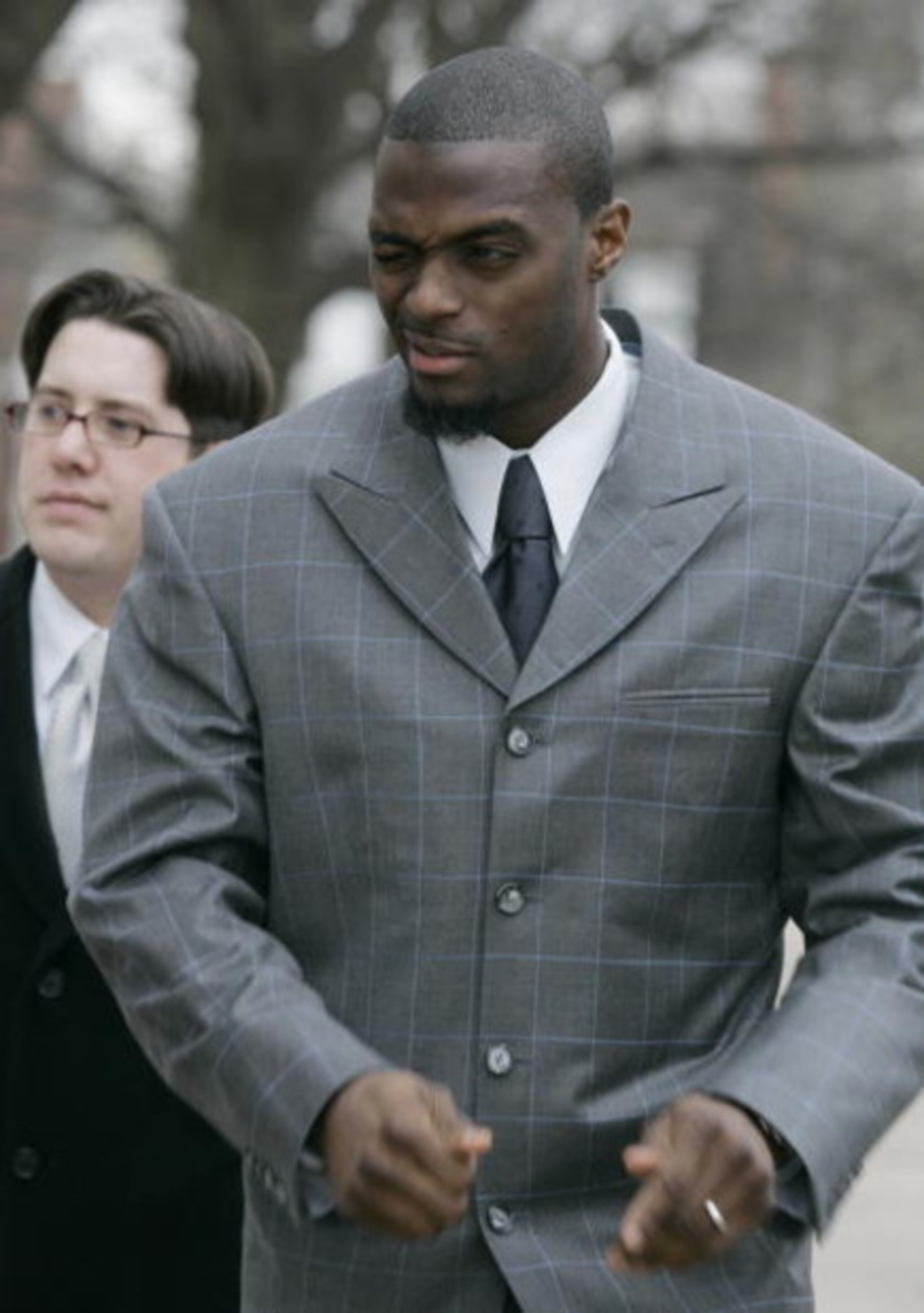 LEBANON - JANUARY 14: New York Giants wide receiver Plaxico Burress winks at a supporter as he arrives at the Lebanon County Courthouse January 14, 2009 in Lebanon, Pa.  Burress is scheduled to appear in a civil trial in a dispute with an automobile deale