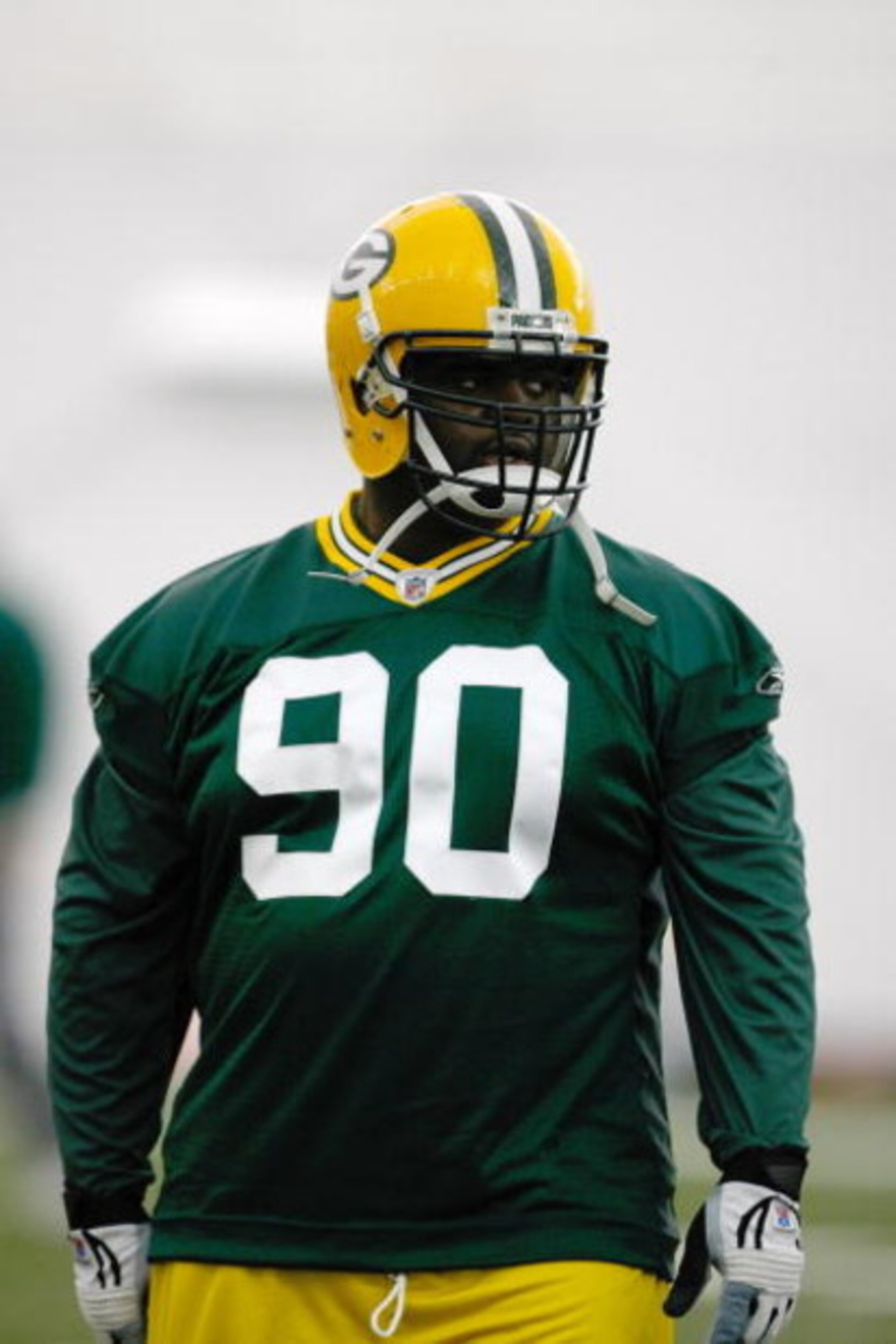 GREEN BAY, WI - MAY 1:  Defensive lineman B.J. Raji #90 runs as he participates in practice drills during Green Bay Packers Minicamp at Don Hutson Center on May 1, 2009 in Green Bay, Wisconsin. (Photo by Scott Boehm/Getty Images)