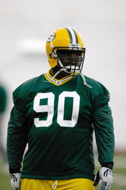 GREEN BAY, WI - MAY 1:  Defensive lineman B.J. Raji #90 runs as he participates in practice drills during Green Bay Packers Minicamp at Don Hutson Center on May 1, 2009 in Green Bay, Wisconsin. (Photo by Scott Boehm/Getty Images)