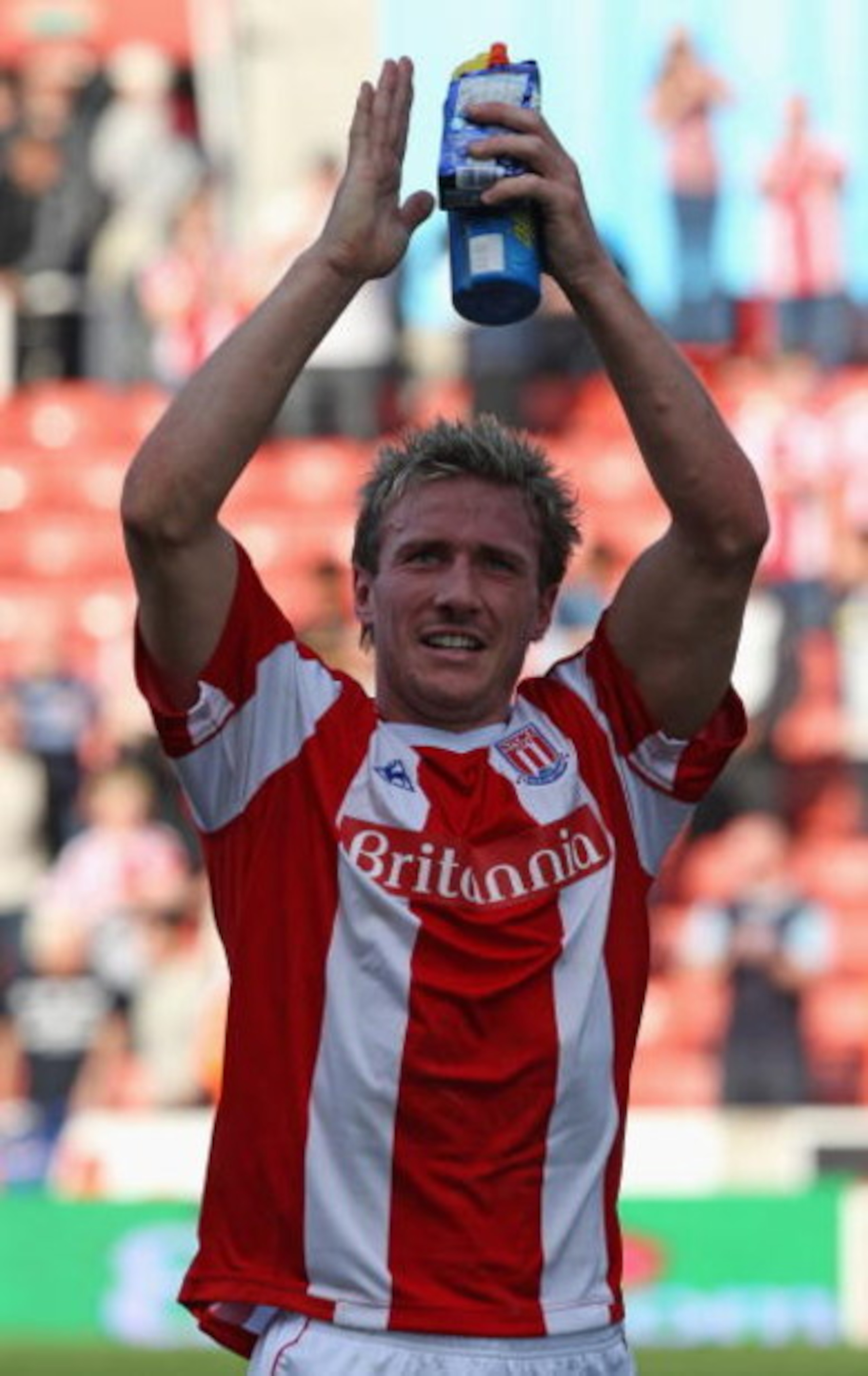 STOKE, ENGLAND - APRIL 18:  Liam Lawrence of Stoke City salutes the fans at the end of the Barclays Premier League match between Stoke City and Blackburn Rovers at The Britannia Stadium on April 18, 2009 in Stoke,England.  (Photo by Ross Kinnaird/Getty Im
