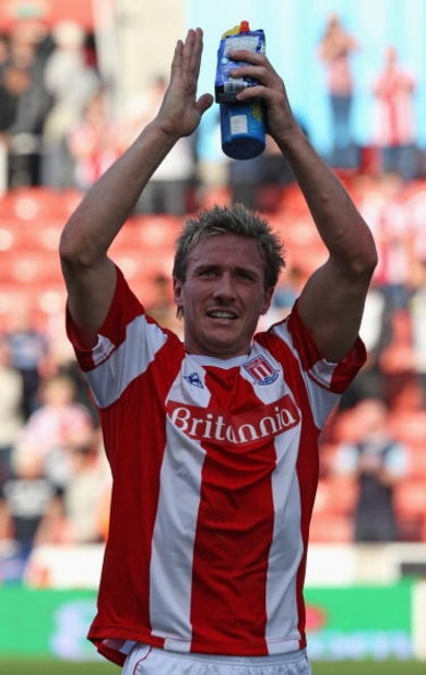 STOKE, ENGLAND - APRIL 18:  Liam Lawrence of Stoke City salutes the fans at the end of the Barclays Premier League match between Stoke City and Blackburn Rovers at The Britannia Stadium on April 18, 2009 in Stoke,England.  (Photo by Ross Kinnaird/Getty Im