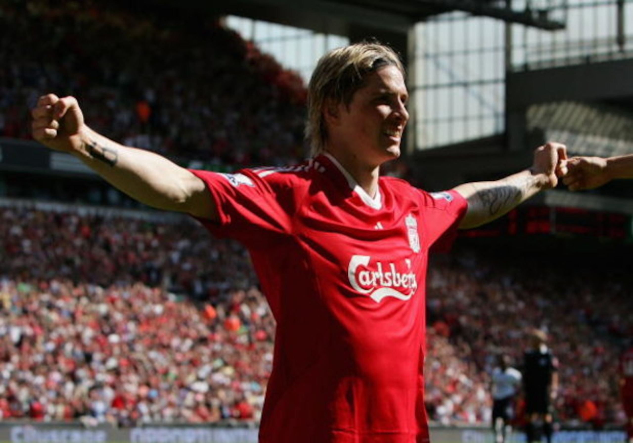 LIVERPOOL, ENGLAND - MAY 24:  Fernando Torres of Liverpool celebrates after scoring the opening goal during the Barclays  Premier League match between Liverpool and Tottenham Hotspur at Anfield on May 24, 2009 in Liverpool, England.  (Photo by Alex Livese