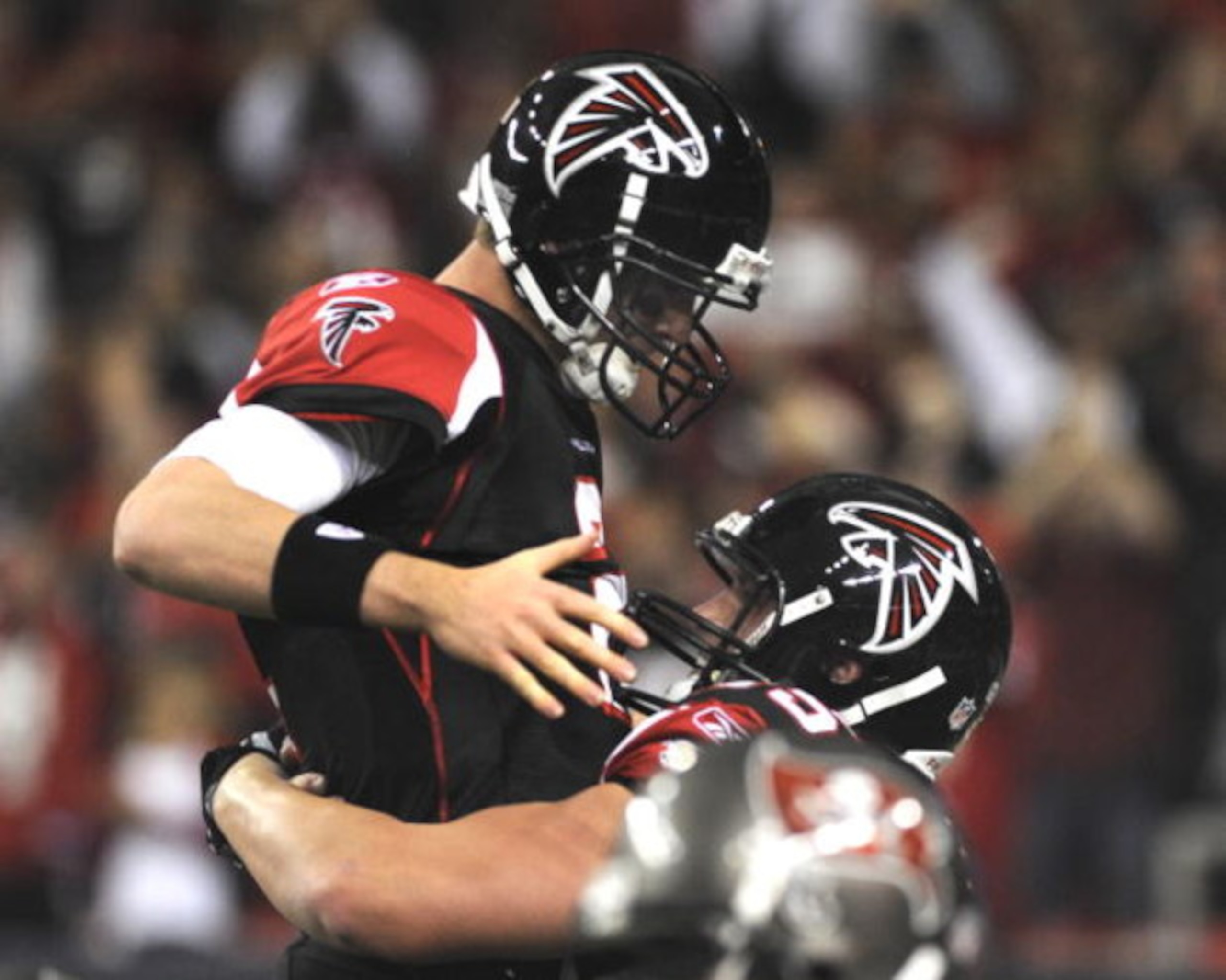 ATLANTA - DECEMBER 14: Quarterback Matt Ryan #2 of the Atlanta Falcons celebrates a touchdown against the Tampa Bay Buccaneers  at the Georgia Dome on December 14, 2008 in Atlanta, Georgia.  (Photo by Al Messerschmidt/Getty Images)