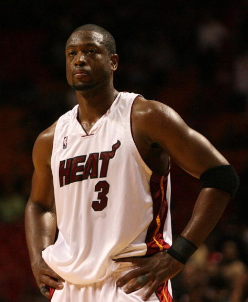MIAMI - APRIL 27:  Dwyane Wade #3 of the Miami Heat reacts with less than a minute to play in the game against the Atlanta Hawks during Game Four of the Eastern Conference Quarterfinals of the 2009 NBA Playoffs at American Airlines Arena on April 27, 2009