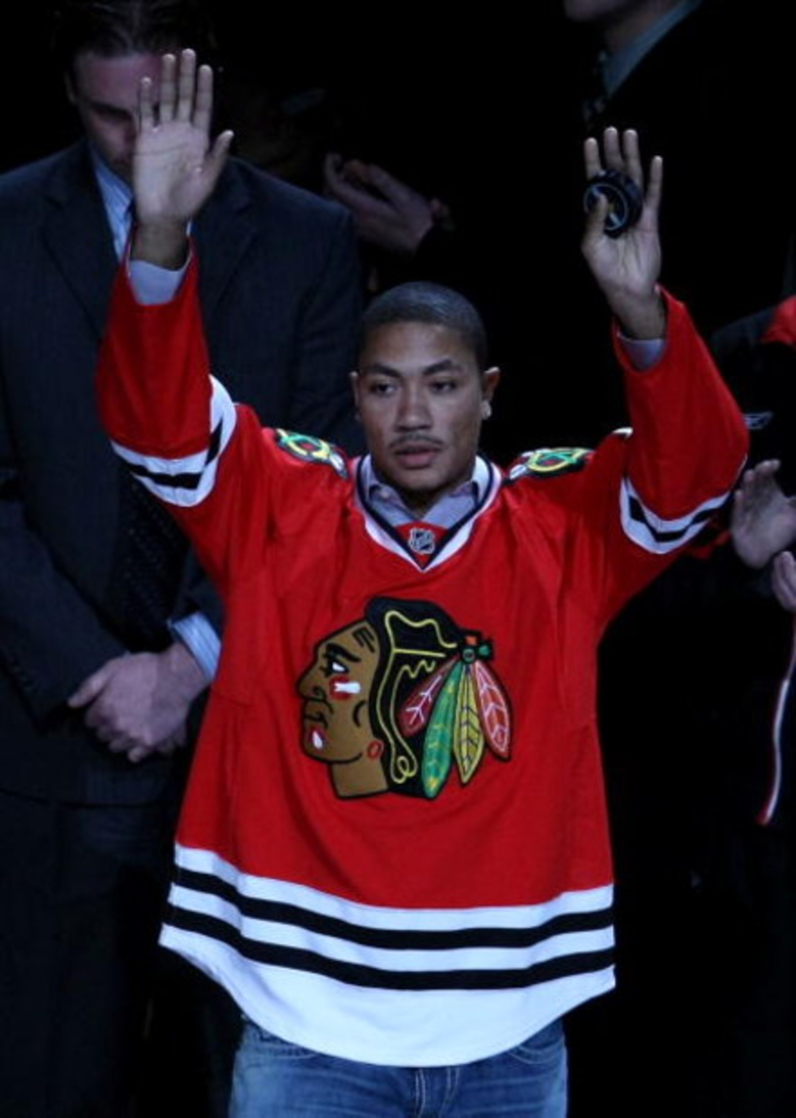CHICAGO - MAY 07:  Derrick Rose of the Chicago Bulls acknoledges the crowd prior to dropping the puck for the ceremonial face off prior the Chicago Blackhawks hosting the Vancouver Canucks during Game Four of the Western Conference Semifinal Round of the 