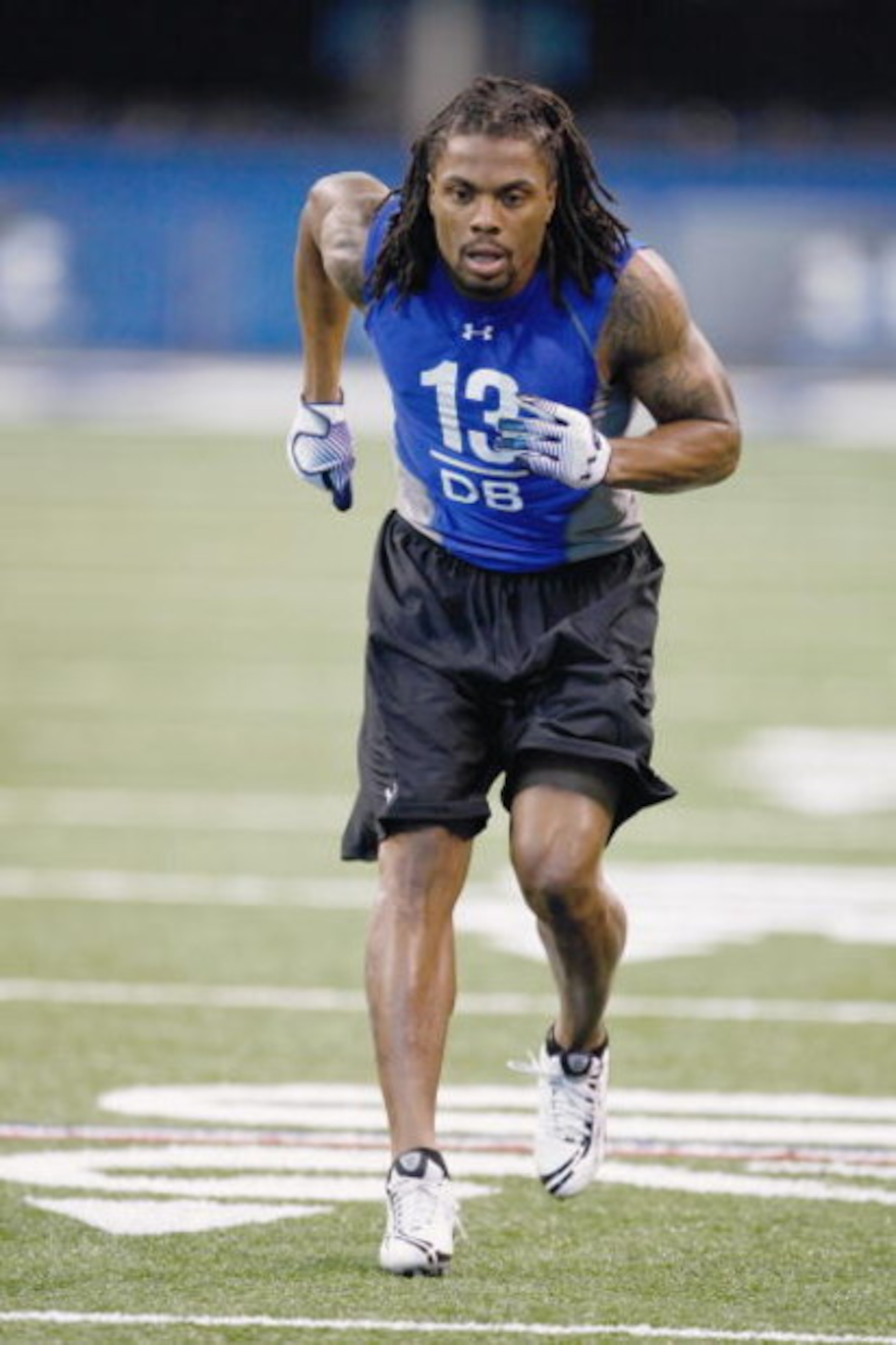 INDIANAPOLIS, IN - FEBRUARY 24:  Defensive back Louis Delmas of Western Michigan runs in practice drills during the NFL Scouting Combine presented by Under Armour at Lucas Oil Stadium on February 24, 2009 in Indianapolis, Indiana. (Photo by Scott Boehm/Ge