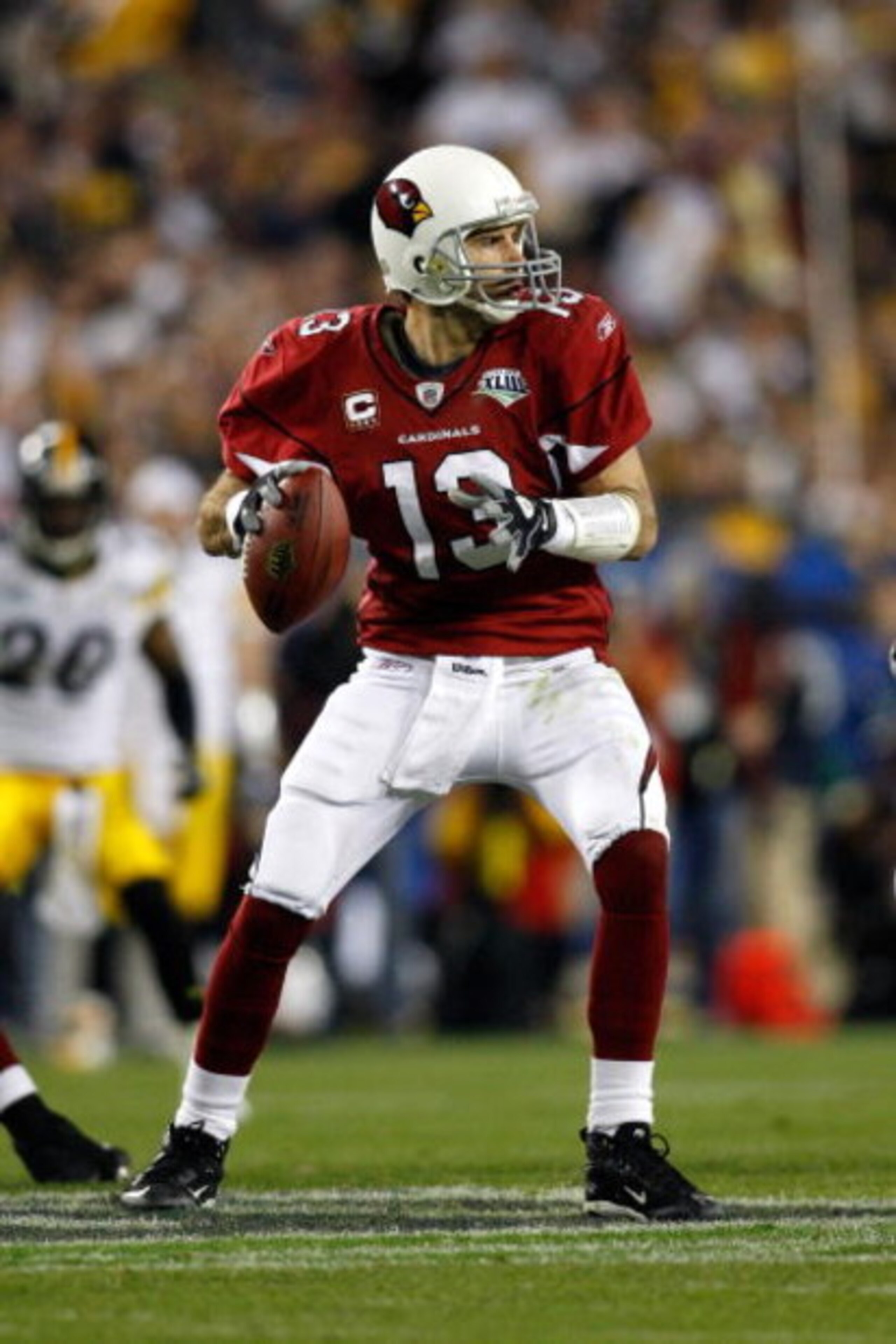 TAMPA, FL - FEBRUARY 01:  Quarterback Kurt Warner #13 of the Arizona Cardinals looks to pass against the Pittsburgh Steelers during Super Bowl XLIII on February 1, 2009 at Raymond James Stadium in Tampa, Florida. Steelers won 27-23. (Photo by Chris Grayth