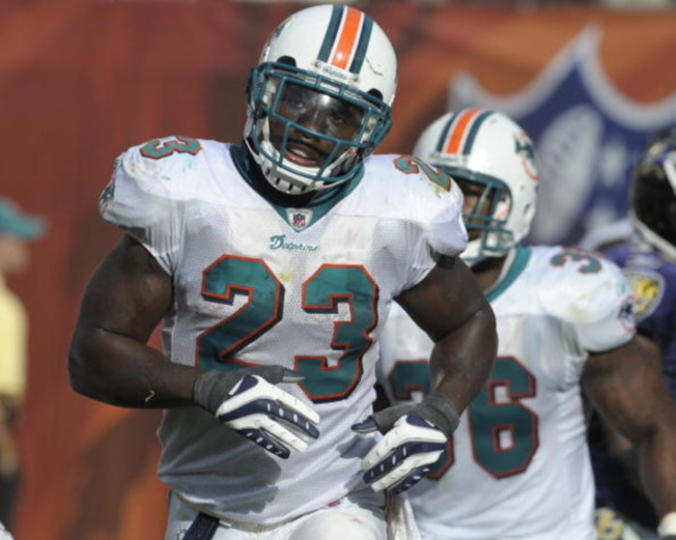 MIAMI, FL - JANUARY 4:  Running back Ronnie Brown #23 of the Miami Dolphins plays against the Baltimore Ravens in an NFL Wildcard Playoff Game at Dolphins Stadium on January 4, 2009 in Miami, Florida.  (Photo by Al Messerschmidt/Getty Images) 