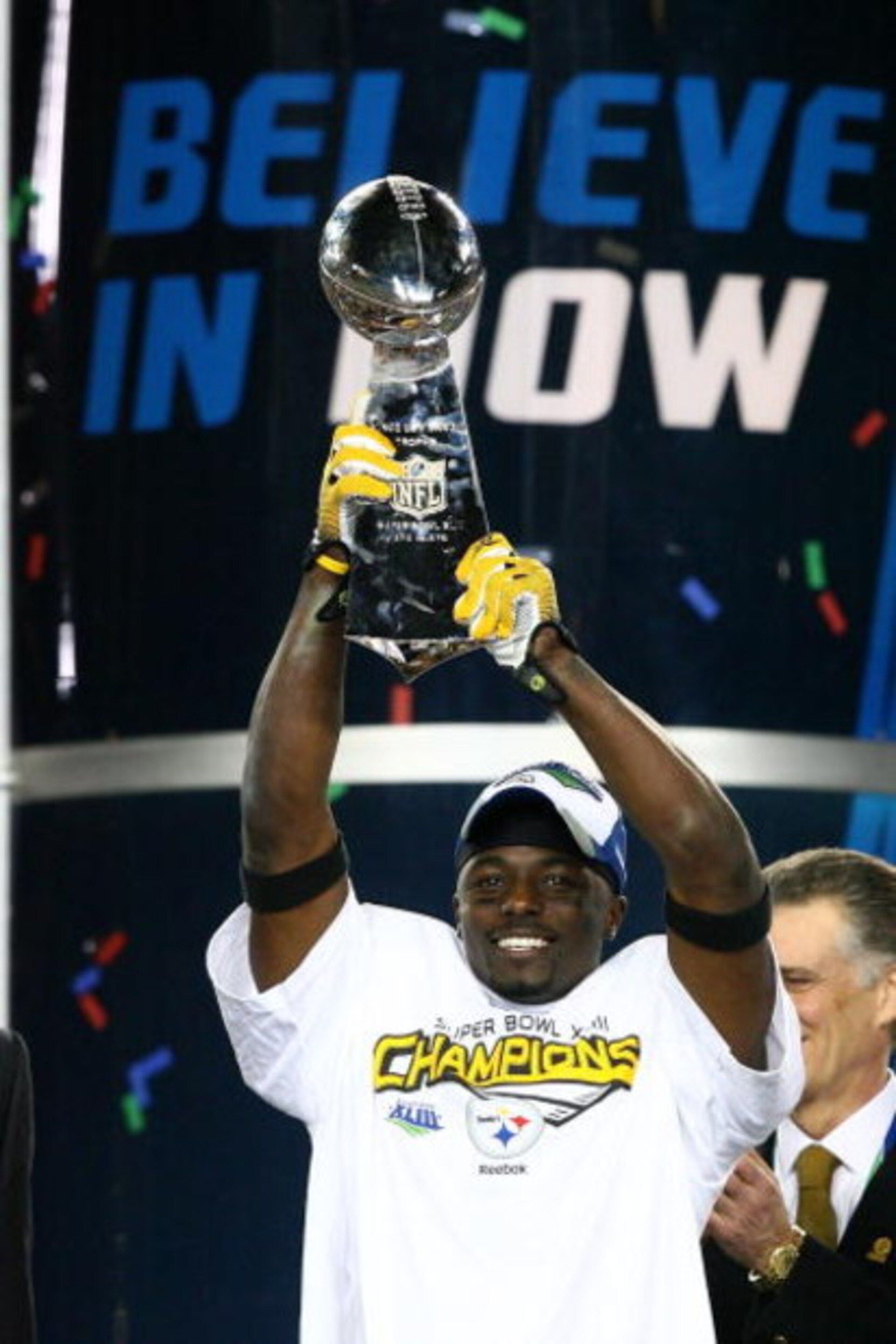 TAMPA, FL - FEBRUARY 01:  Super Bowl MVP Santonio Holmes #10 of the Pittsburgh Steelers celebrates with the Vince Lombardi trophy after their 27-23 win against the Arizona Cardinals during Super Bowl XLIII on February 1, 2009 at Raymond James Stadium in T