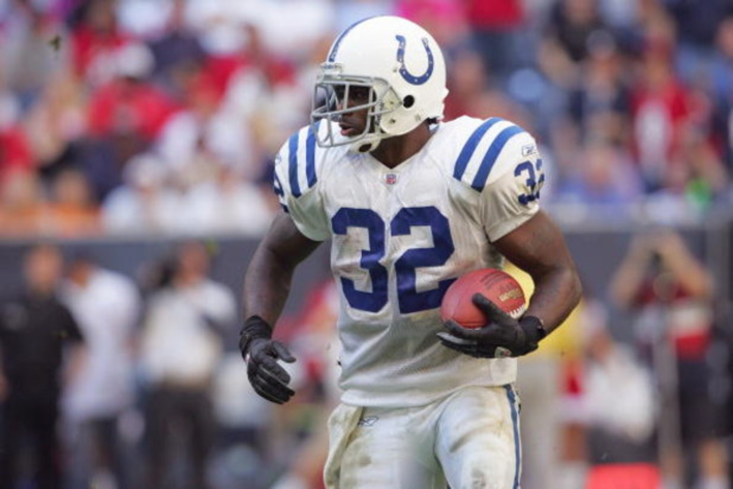 HOUSTON - DECEMBER 12: Running back Edgerrin James #32 of the Indianapolis Colts carries the ball against the Houston Texans during the game on December 12, 2004 at Reliant Stadium in Houston, Texas. The Colts defeated the Titans 23-14. (Photo by Matthe HOUSTON - DECEMBER 12: Running back Edgerrin James #32 of the Indianapolis Colts carries the ball against the Houston Texans during the game on December 12, 2004 at Reliant Stadium in Houston, Texas. The Colts defeated the Titans 23-14. (Photo by Matthe