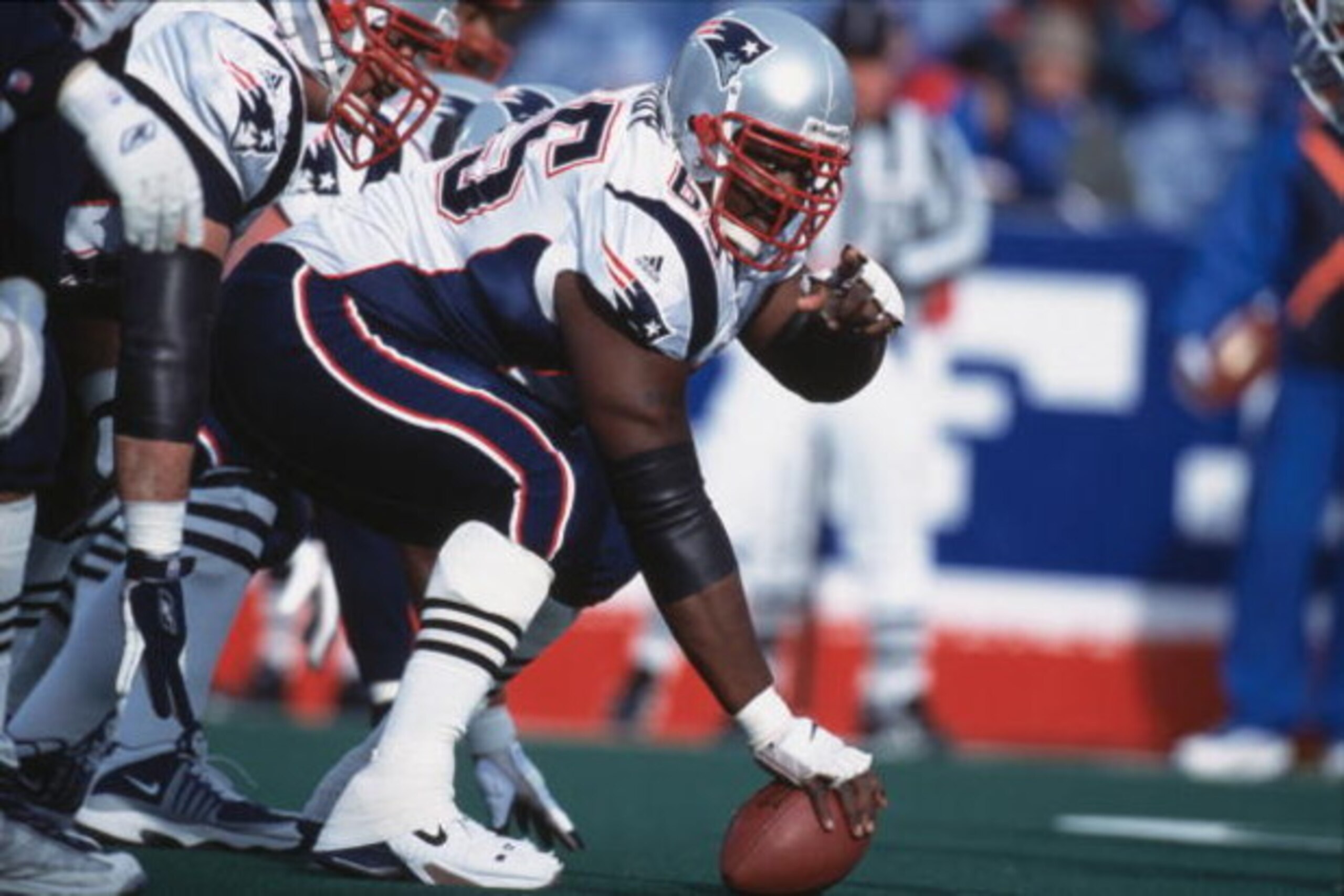 16 Dec 2001: Center Damien Woody #65 of the New England Patriots gets ready to hike the ball during the game against the Buffalo Bills at the Ralph Wilson Stadium in Orchard Park, New York. The Patriots defeated the Bills 12-9.Mandatory Credit: Rick Stew 16 Dec 2001: Center Damien Woody #65 of the New England Patriots gets ready to hike the ball during the game against the Buffalo Bills at the Ralph Wilson Stadium in Orchard Park, New York. The Patriots defeated the Bills 12-9.Mandatory Credit: Rick Stew