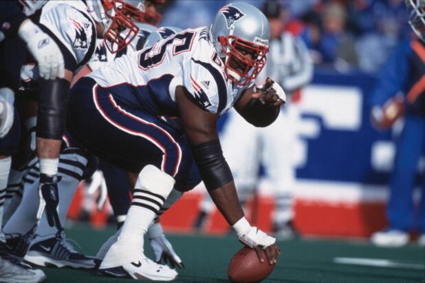 16 Dec 2001:  Center Damien Woody #65 of the New England Patriots gets ready to hike the ball during the game against the Buffalo Bills at the Ralph Wilson Stadium in Orchard Park, New York. The Patriots defeated the Bills 12-9.Mandatory Credit: Rick Stew