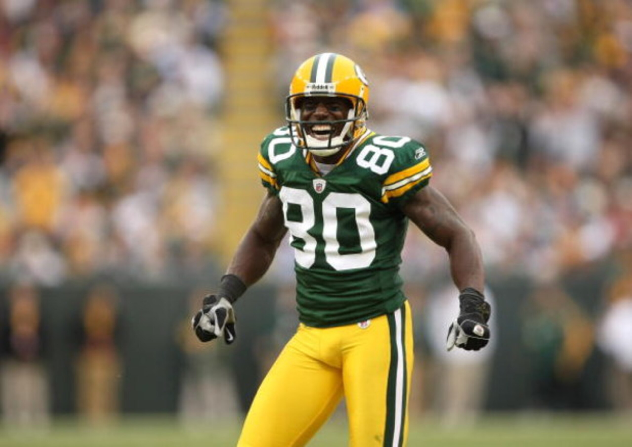 GREEN BAY, WI - OCTOBER 19:  Wide Receiver Donald Driver #80 of the Green Bay Packers celebrates during the game against the Indianapolis Colts on October 19, 2008 at Lambeau Field in Green Bay Wisconsin.  The Packers won 34-14.  (Photo by Stephen Dunn/Ge