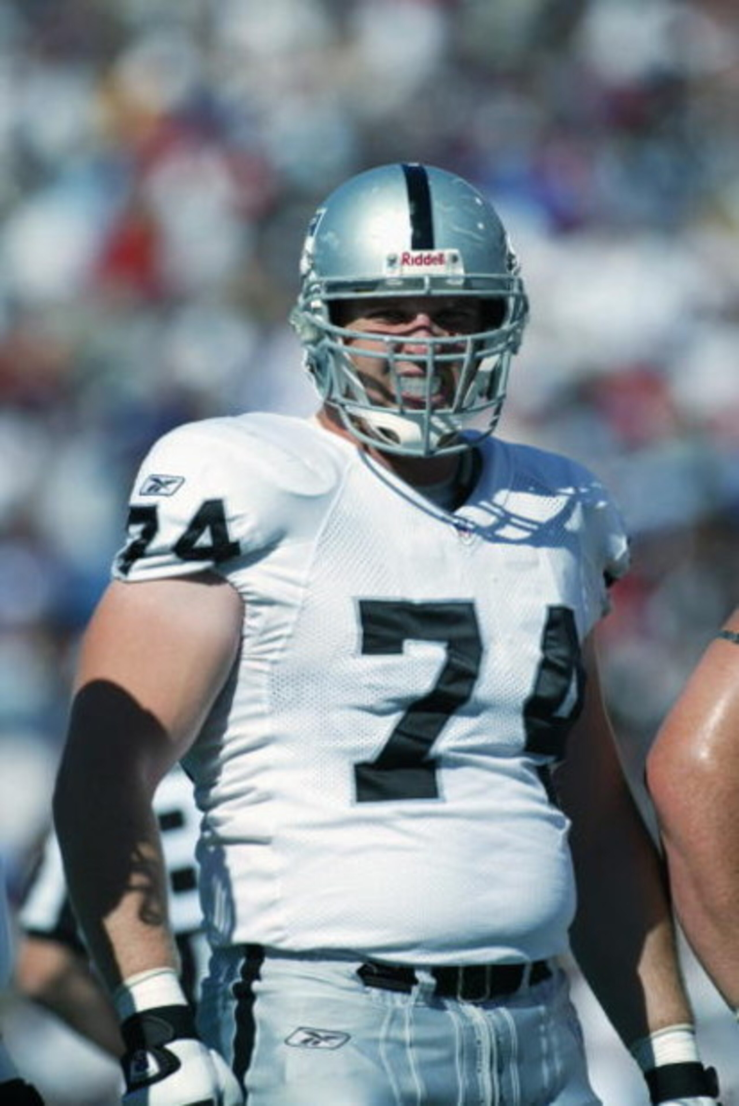 ORCHARD PARK, NY - October 6: Guard Matt Stinchcomb #74 of the Oakland Raiders warms up before the NFL game against the Buffalo Bills on October 6, 2002 at Ralph Wilson Stadium in Orchard Park, New York. The Raiders won 49-31. (Photo by Rick Stewart/Get ORCHARD PARK, NY - October 6: Guard Matt Stinchcomb #74 of the Oakland Raiders warms up before the NFL game against the Buffalo Bills on October 6, 2002 at Ralph Wilson Stadium in Orchard Park, New York. The Raiders won 49-31. (Photo by Rick Stewart/Get