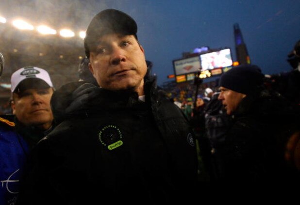 FOXBORO, MA - DECEMBER 16:  Coach Eric Mangini of the New York Jets leaves the field after shaking the hand of coach Bill Belichick at Gillette Stadium on December 16, 2007 in Foxboro, Massachusetts. The Patriots won 20-10. (Photo by Jim Rogash/Getty Imag