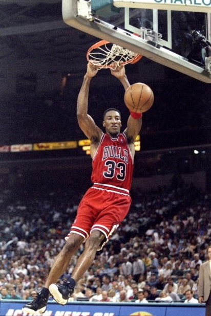 8 May 1998:  Scottie Pippen #33 of the Chicago Bulls jumps to dunk the ball during the East Conference Semifinals against the Charlotte Hornets  at Charlotte Coliseum in Charlotte, North Carolina. The Bulls defeated the Hornets 103-83. Mandatory Credit: C