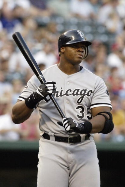ARLINGTON, TX - AUGUST 17:  Frank Thomas #35 of the Chicago White Sox readies to bat against the Texas Rangers at the Ballpark in Arlington on August 17, 2003 in Arlington, Texas.  The White Sox defeated the Rangers 6-4.  (Photo by Ronald Martinez/Getty I