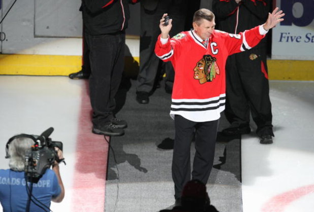 CHICAGO - APRIL 25: Former Chicago Blackhawks player Stan Mikita waves to the crowd prior to the start of play against the Calgary Flames during Game Five of the Western Conference Quarterfinals of the 2009 Stanley Cup Playoffs on April 25, 2009 at the Un