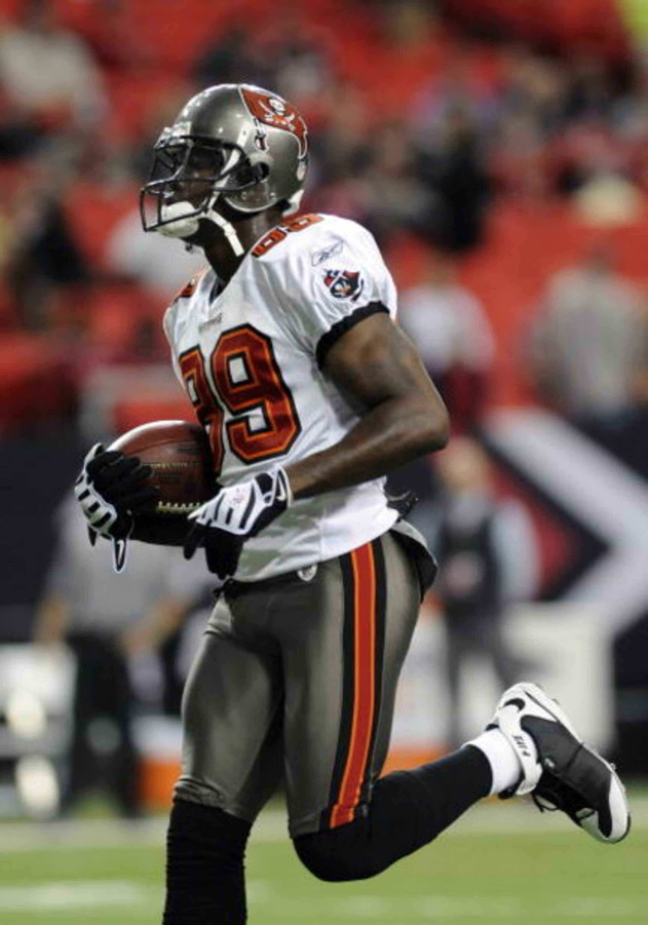 ATLANTA - DECEMBER 14: Wide receiver Antonio Bryant #89 of the Tampa Bay Buccaneers warms up for play against the Atlanta Falcons at the Georgia Dome on December 14, 2008 in Atlanta, Georgia.  (Photo by Al Messerschmidt/Getty Images) 