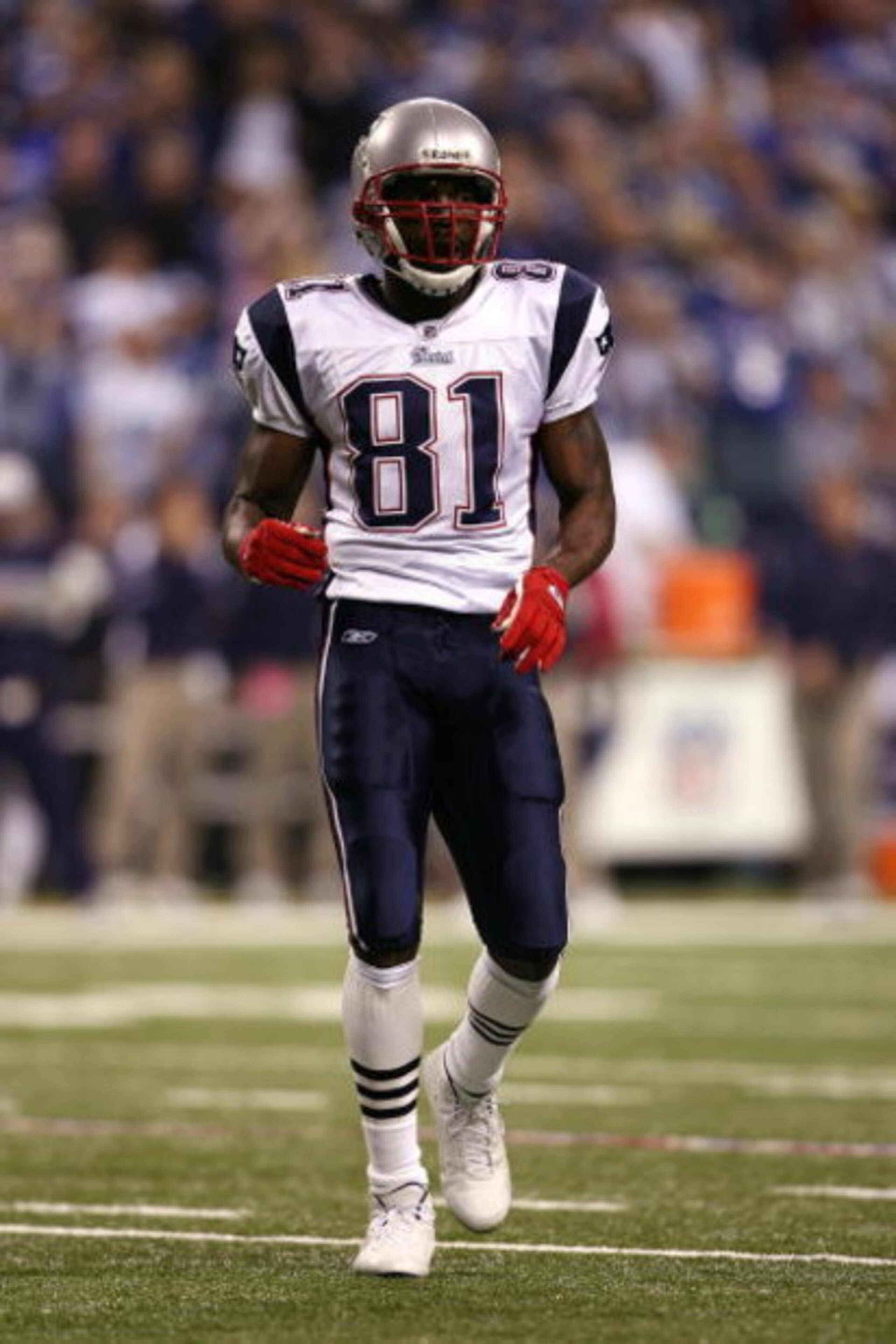 INDIANAPOLIS - NOVEMBER 02:  Randy Moss #81 of the New England Patriots walks on the field against the Indianapolis Colts at Lucas Oil Stadium on November 2, 2008 in Indianapolis, Indiana.  (Photo by Andy Lyons/Getty Images)