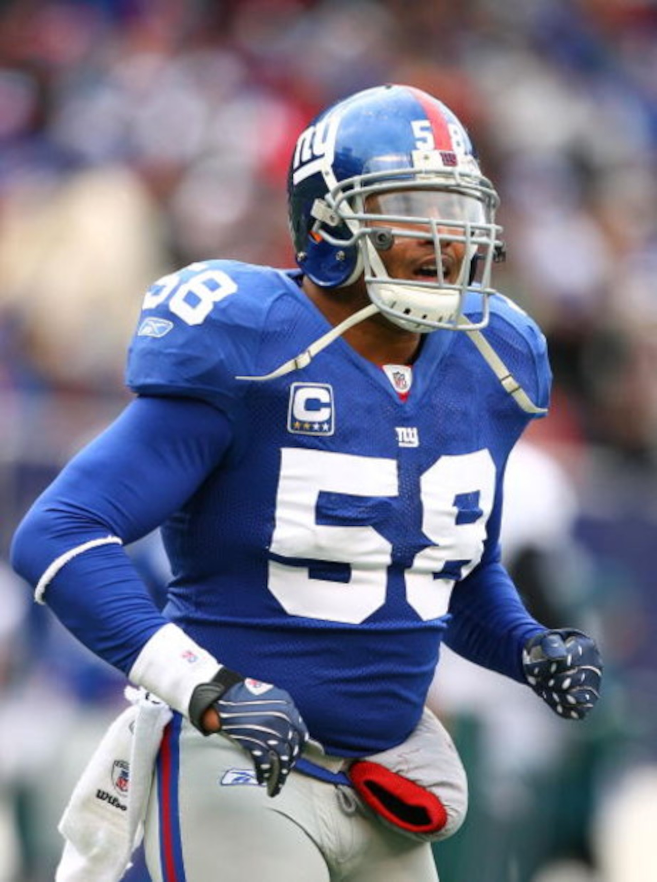 EAST RUTHERFORD, NJ - DECEMBER 07:  Antonio Pierce #58 of the New York Giants in action against the Philadelphia Eagles during their game on December 7, 2008 at Giants Stadium in East Rutherford, New Jersey.  (Photo by Al Bello/Getty Images)