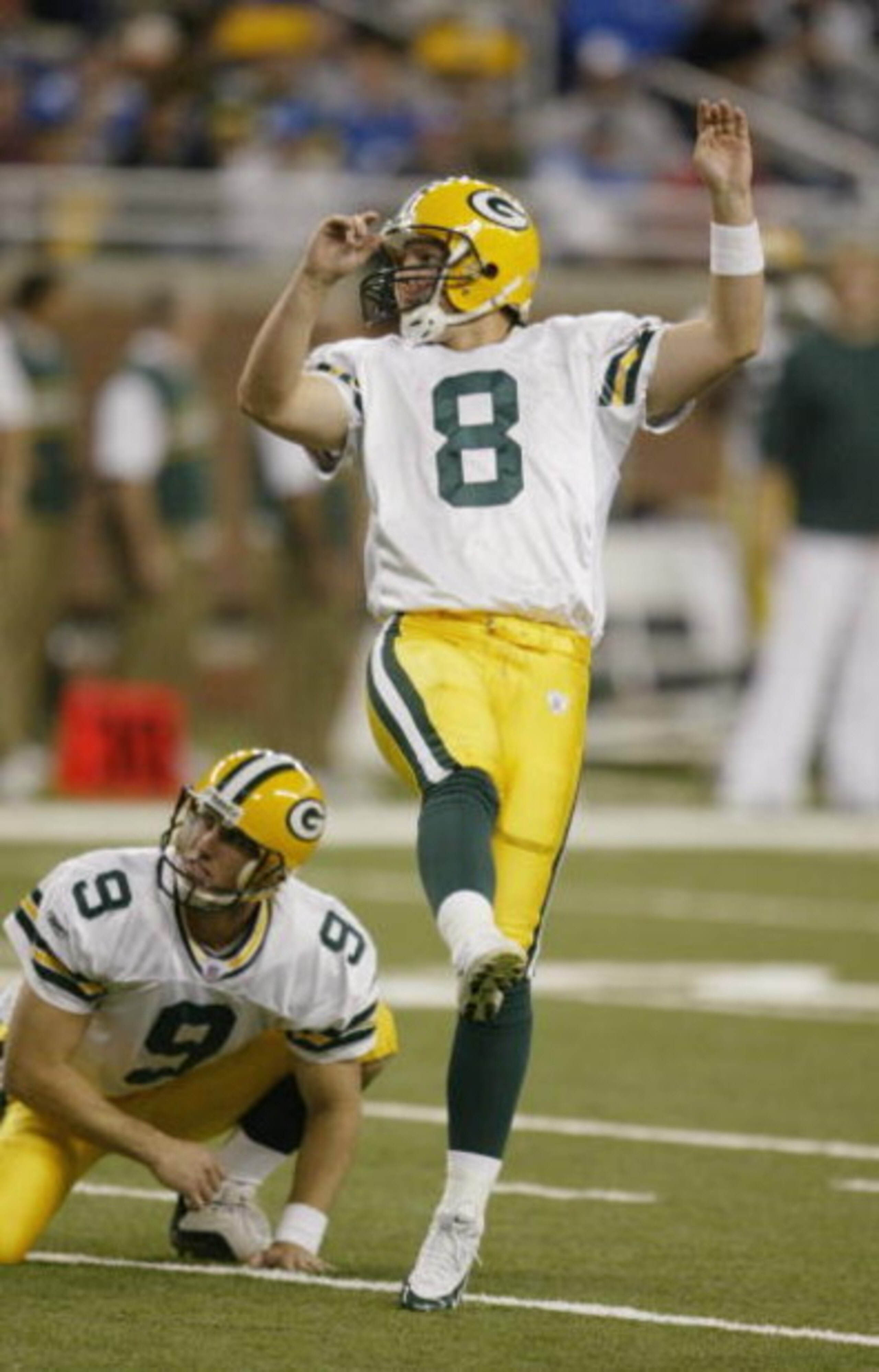 DETROIT - OCTOBER 17:  Kicker Ryan Longwell #8 of the Green Bay Packers watches the flight of the ball after his kick during a game against the Detroit Lions at Ford Field on October 17, 2004 in Detroit, Michigan. The Packers won the game, 38-10. (Photo b