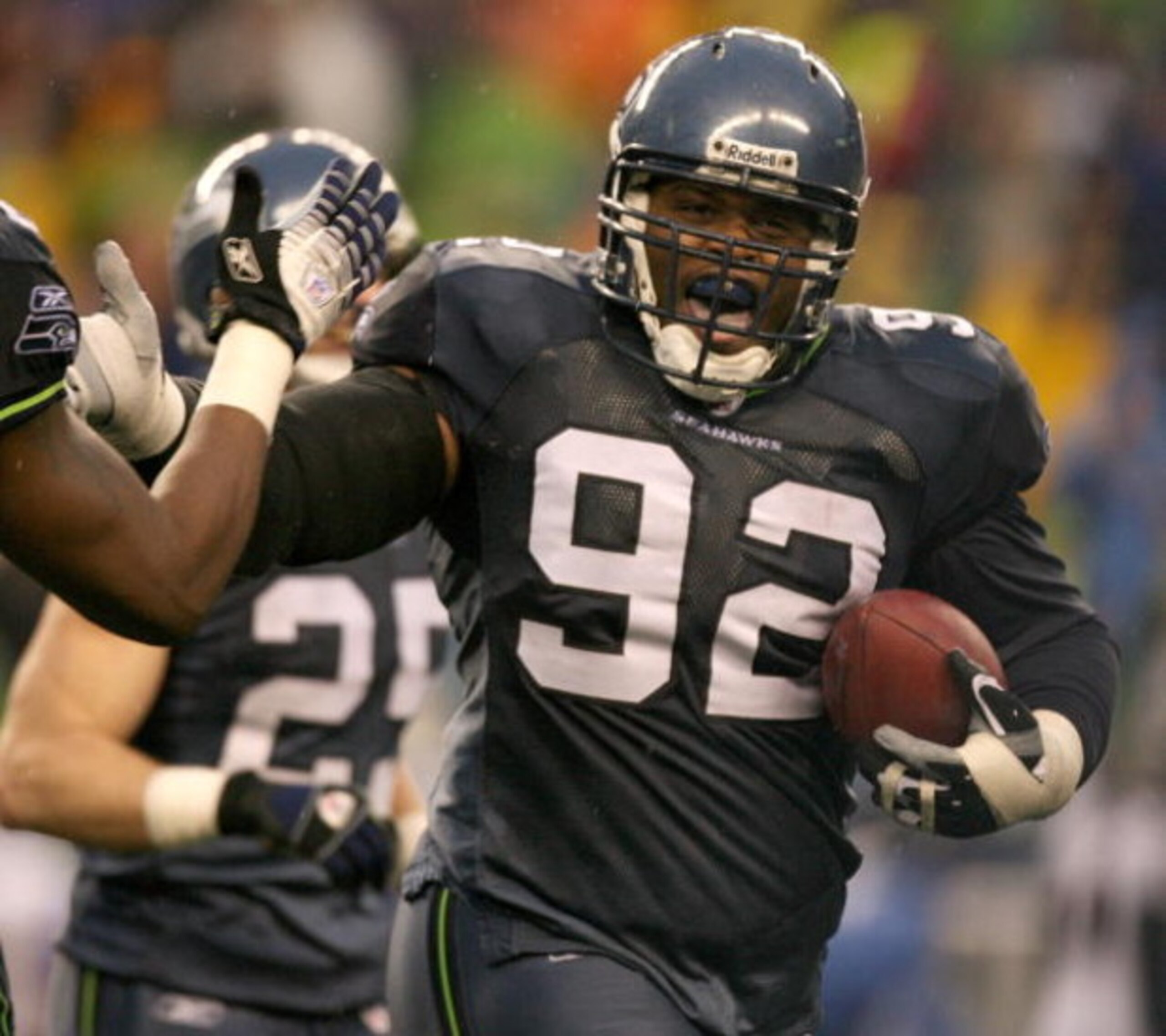 SEATTLE - DECEMBER 23:  Defensive tackle Brandon Mebane #92 of the Seattle Seahawks celebrates after recovering a fumble against the Baltimore Ravens at Qwest Field on December 23, 2007 in Seattle, Washington. The Seahawks defeated the Ravens 27-6.  (Phot