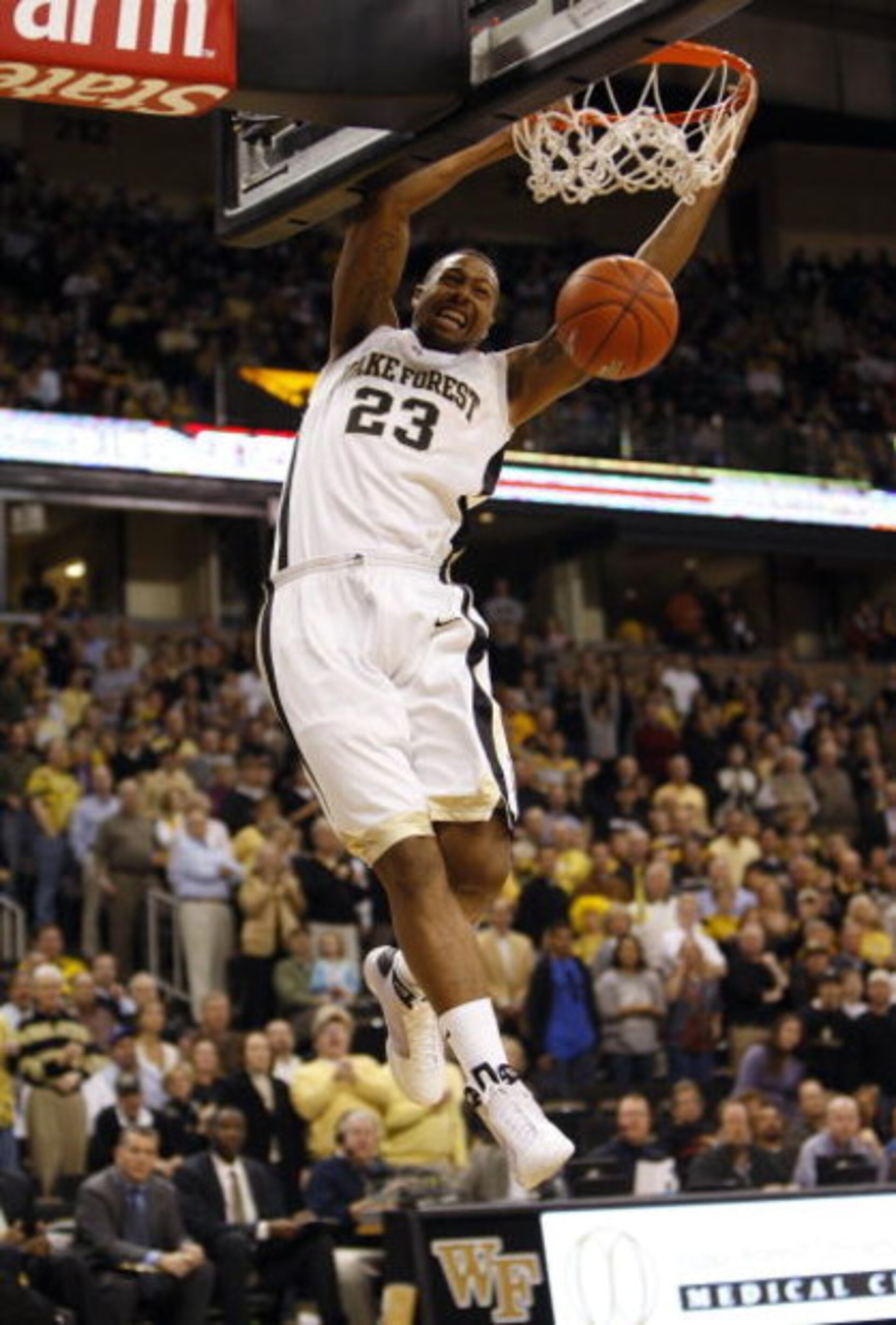 WINSTON-SALEM, NC - FEBRUARY 18: James Johnson #23 of the Wake Forest Demon Deacons goes up for the slam dunk during their game against the Georgia Tech Yellow Jackets at Lawrence Joel Coliseum on February 18, 2009 in Winston-Salem, North Carolina. The D WINSTON-SALEM, NC - FEBRUARY 18: James Johnson #23 of the Wake Forest Demon Deacons goes up for the slam dunk during their game against the Georgia Tech Yellow Jackets at Lawrence Joel Coliseum on February 18, 2009 in Winston-Salem, North Carolina. The D
